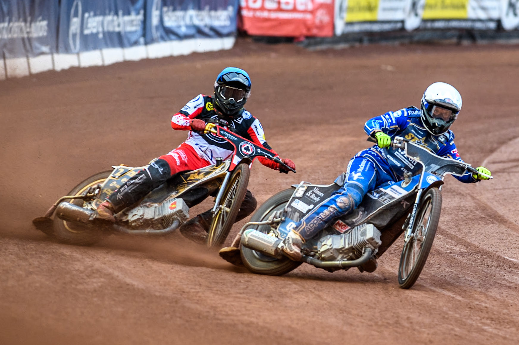 King Lynn Stars' Nicolai Klindt in White leading Belle Vue Aces' Norick Blodorn in Blue during the Rowe Motor Oil Premiership match between Belle Vue Aces and King's Lynn Stars at the National Speedway Stadium, Manchester on Monday 20th May 2024. (Photo: Ian Charles | MI News)