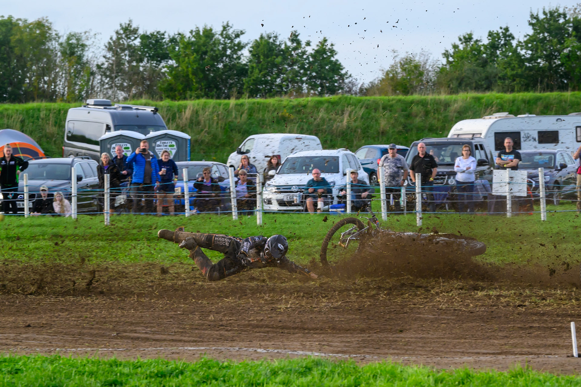 British Masters (Solos): Ashton Vale (152) catches the back wheel of Chris Harris (37)  and comes off during the British Masters Grasstrack Championship at Lower Marsh Farm, Much Hoole, Preston in Lancashire, England on Sunday 13th September 2026. (Photo: Ian Charles | MI News)
