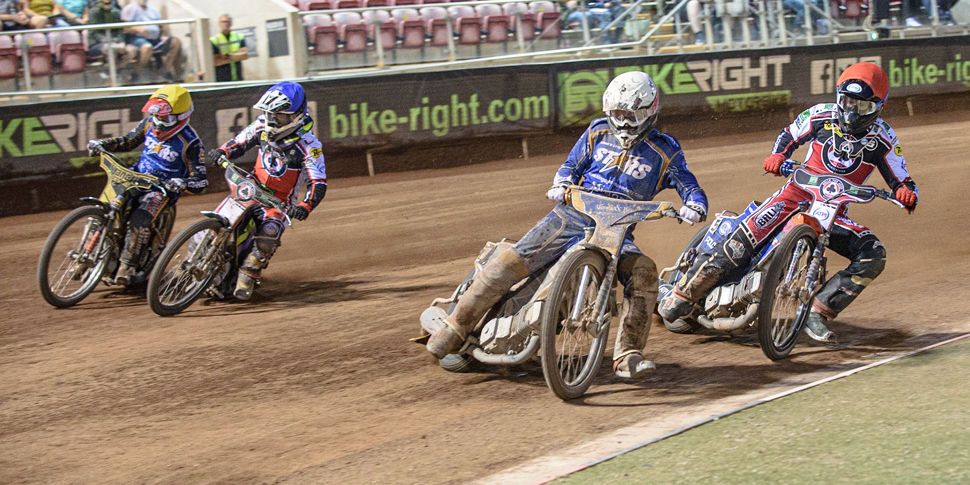 MANCHESTER, UK. AUGUST 23RD    Richard Lawson  (White) leads Brady Kurtz  (Red) Tom Brennan  (Blue) and Ben Barker  (Yellow) during the SGB Premiership match between Belle Vue Aces and King's Lynn Stars at the National Speedway Stadium, Manchester on Monday 23rd August 2021. (Credit: Ian Charles | MI News)