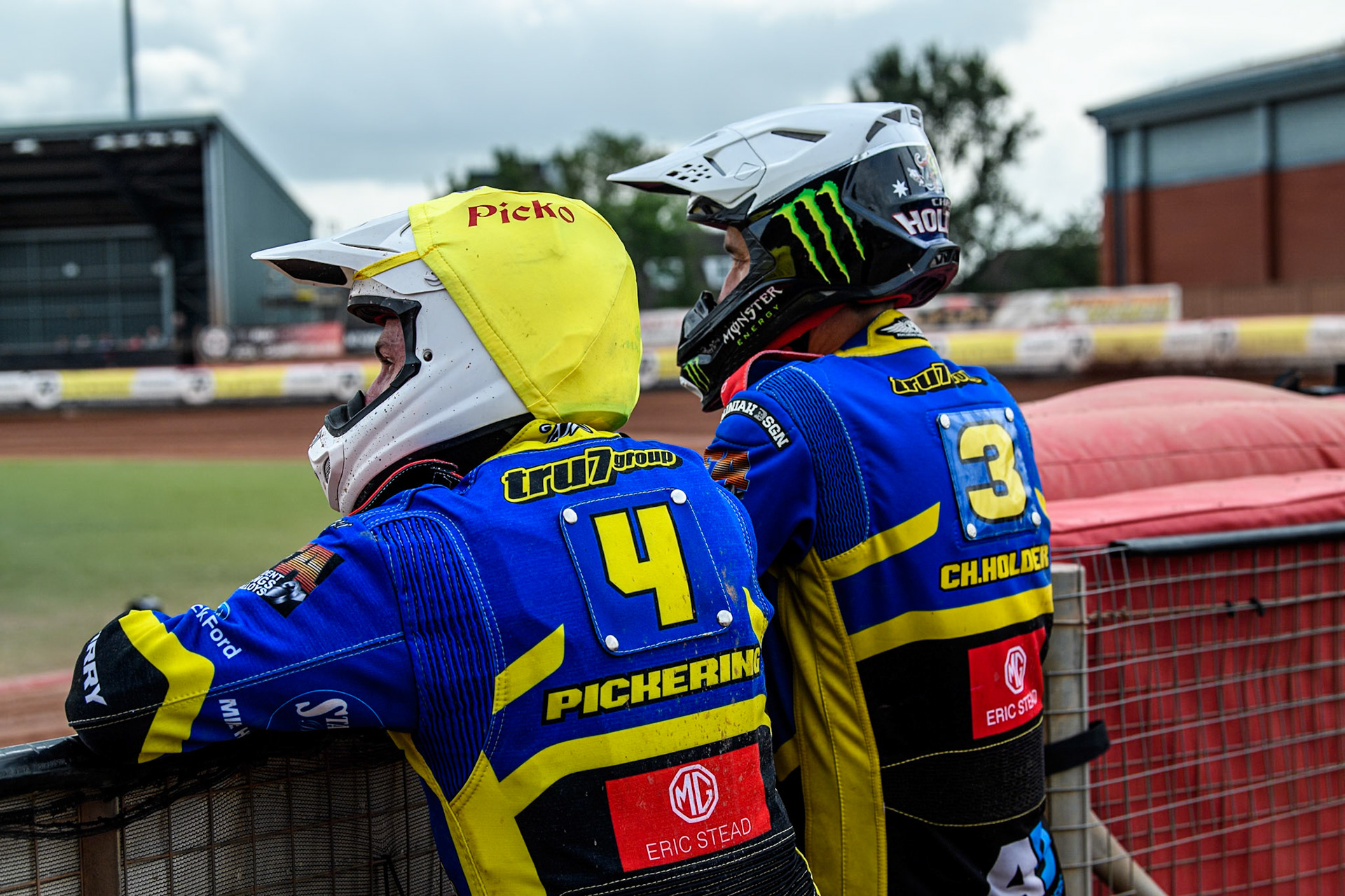 Sheffield Tigers' Josh Pickering  (Left) and Sheffield Tigers' Chris Holder  watch the track prep during the Rowe Motor Oil Premiership match between Belle Vue Aces and Sheffield Tigers at the National Speedway Stadium, Manchester on Monday 26th August 2024. (Photo: Ian Charles | MI News)
