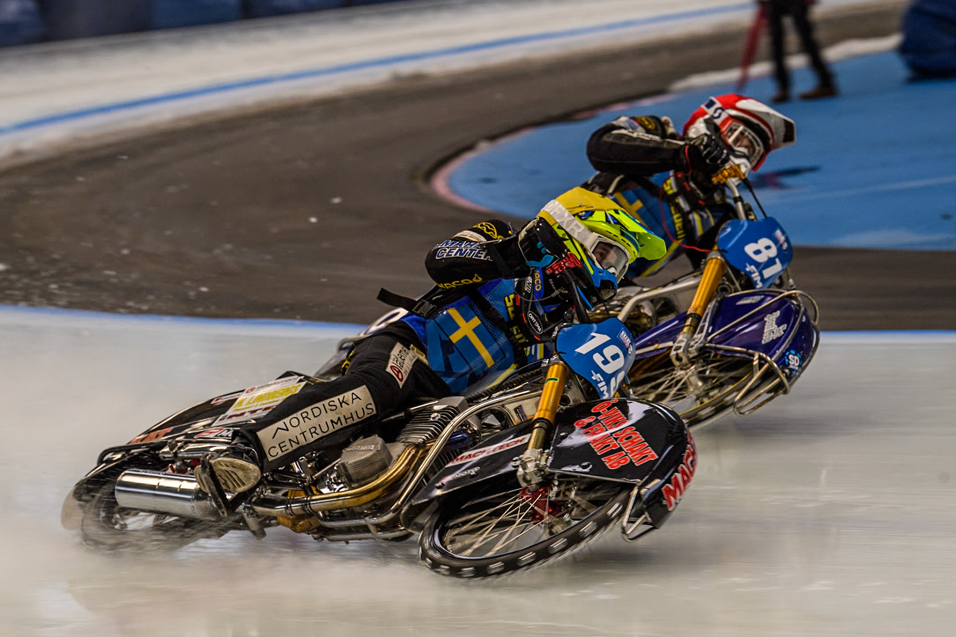 Sweden's Martin Haarahiltunen (199) (Yellow) outside Sweden"s Jimmy Olsén (81) (Red) during the FIM Ice Speedway Gladiators World Championship Final 2 at the Max-Aicher-Arena, Inzell on Sunday 24 March 2024. (Photo: Ian Charles | MI News)