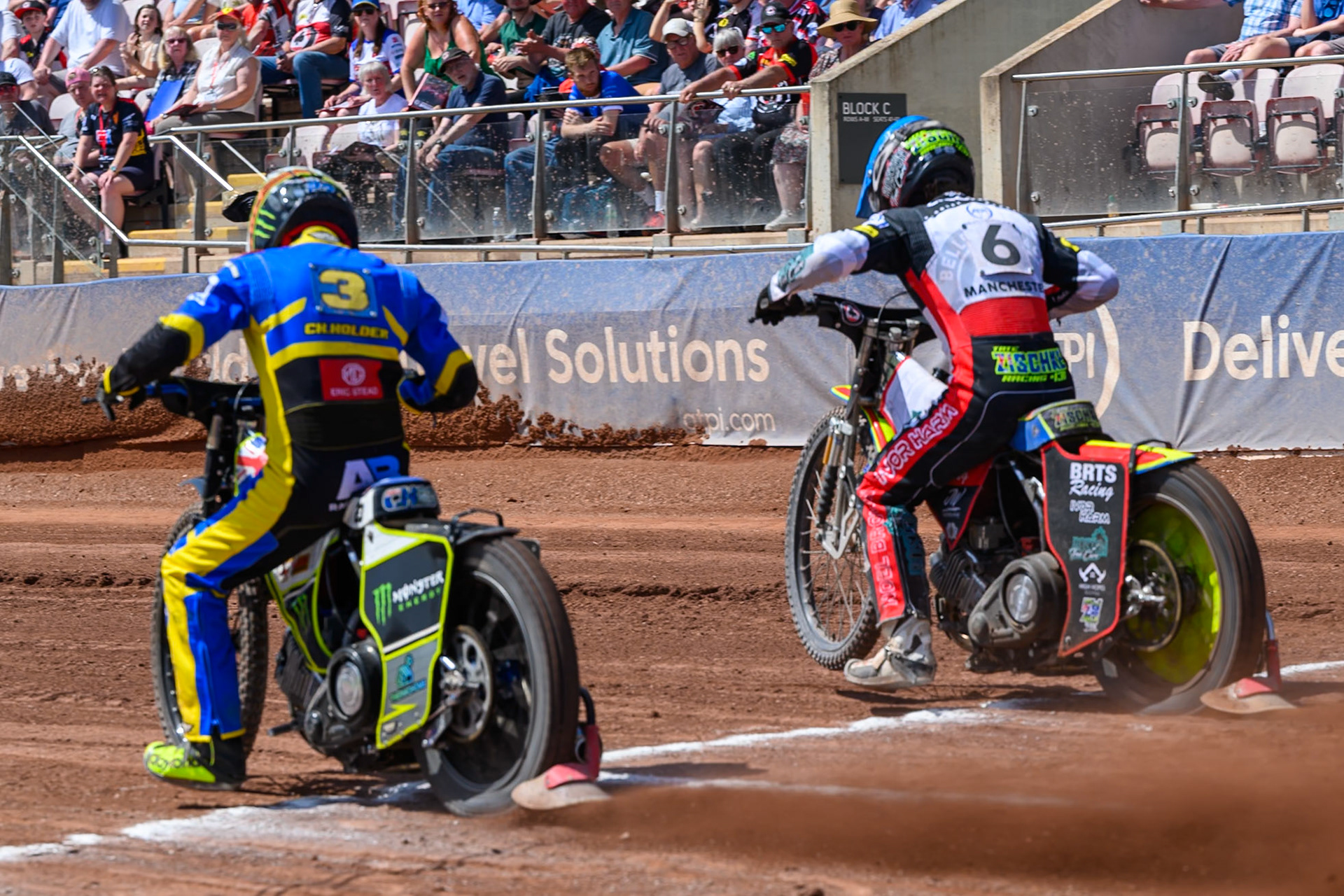 Chris Holder of Sheffield Tigers in White and Tate Zischke of Belle Vue Aces in Blue leave the start line during the Rowe Motor Oil Premiership match between Belle Vue Aces and Sheffield Tigers at the National Speedway Stadium, Manchester on Monday 25th May 2026. (Photo: Ian Charles | MI News)