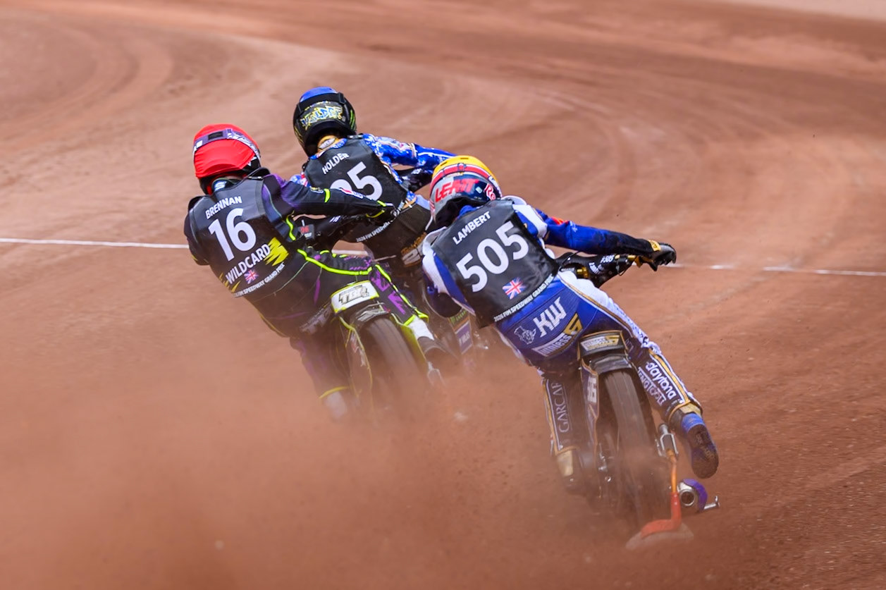 Robert Lambert (505) of Great Britain in Yellow chases Wild Card Tom Brennan (16) of Great Britain in Red and Jack Holder (25) of Australia in Blue in the Sprint Race during the ATPI  FIM Speedway GP of Manchester at the National Speedway Stadium, Manchester on Friday 5th June 2026. (Photo: Ian Charles | MI News)