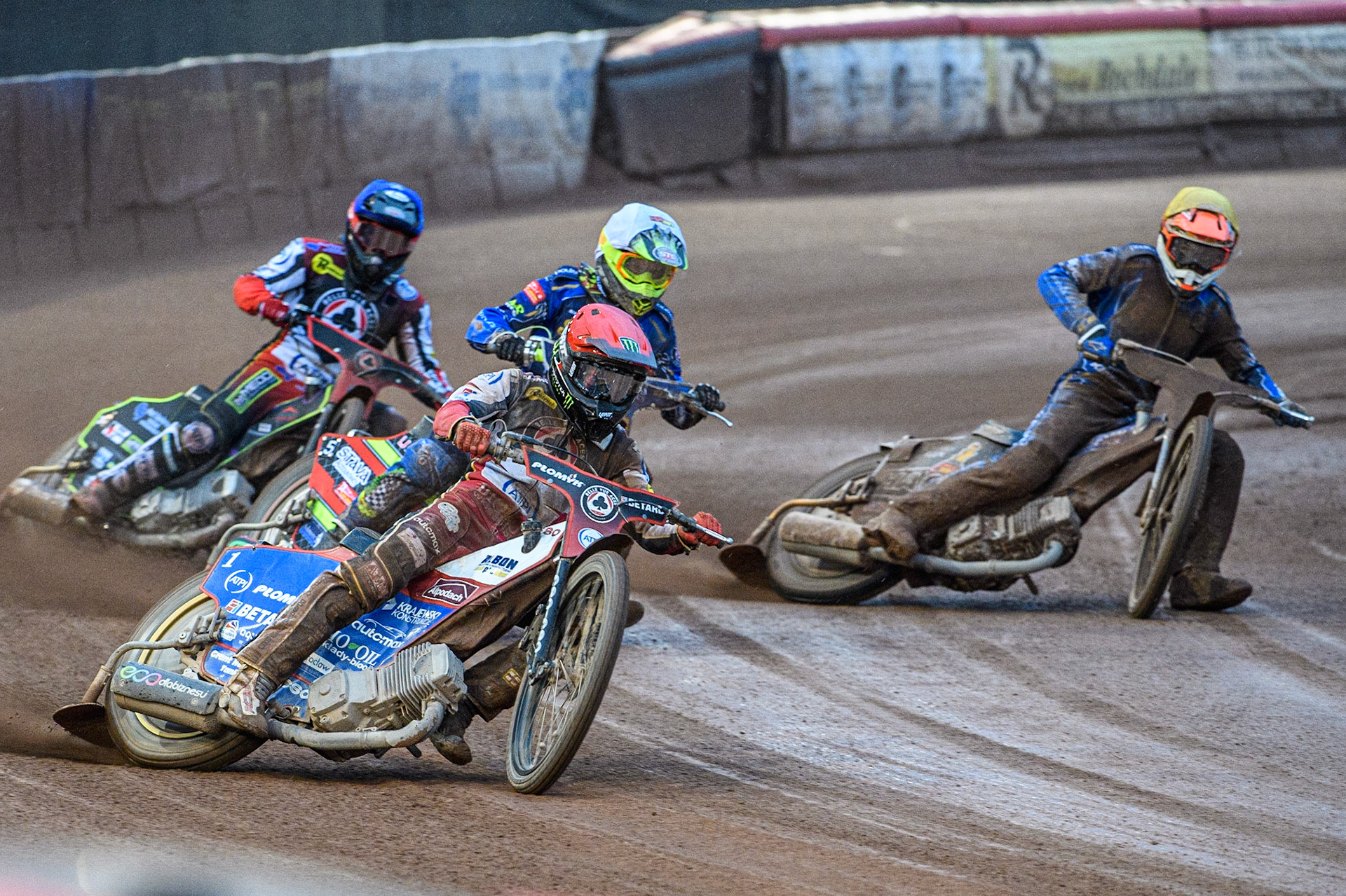Dan Bewley (Red) leads Michael Palm Toft (White), Tom Brennan (Blue) and Jason Edwards (Yellow) during the Sports Insure Premiership match between Belle Vue Aces and King's Lynn Stars at the National Speedway Stadium, Manchester on Monday 12th June 2023. (Photo: Ian Charles | MI News)