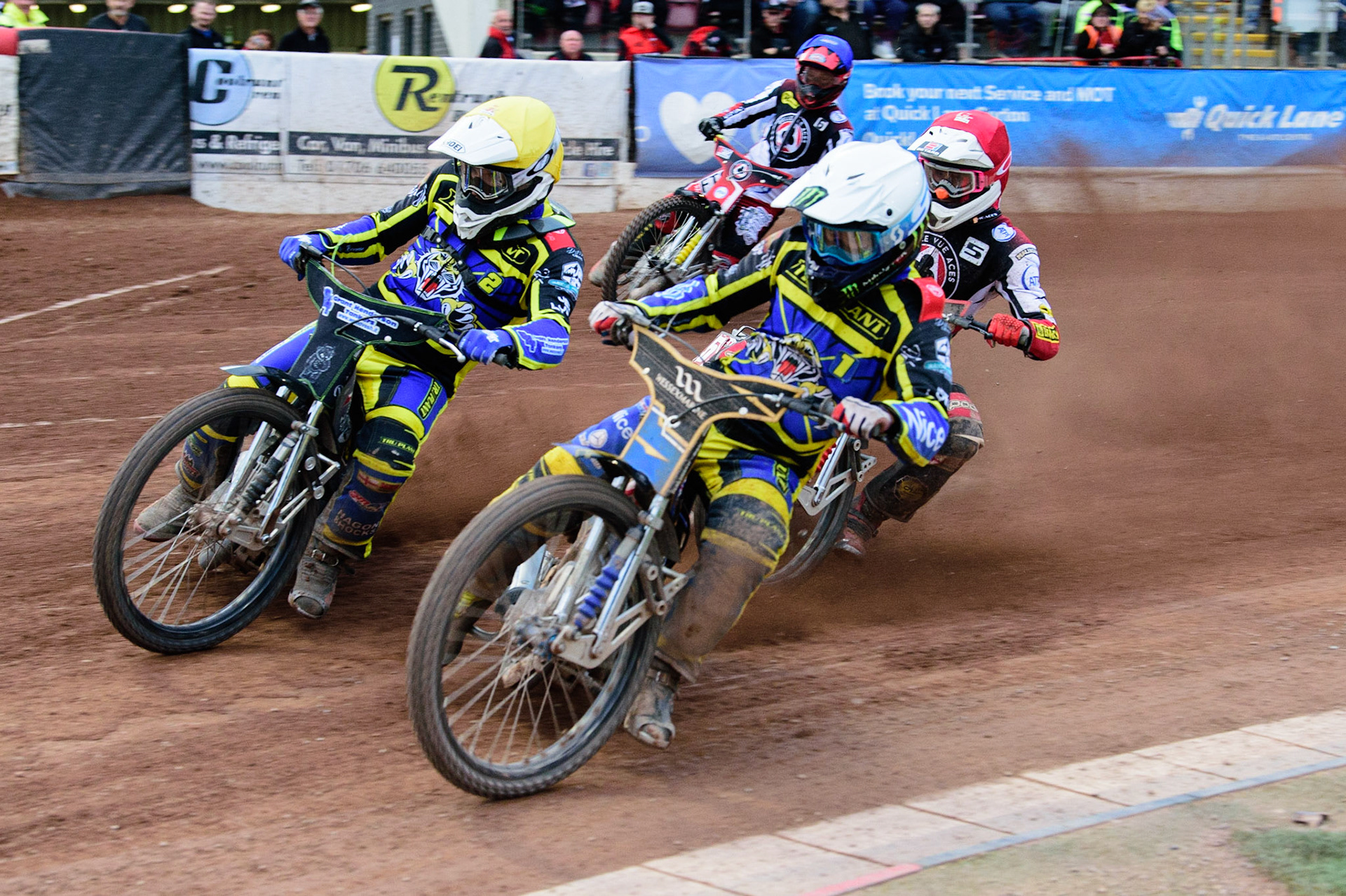 MANCHESTER, UK. JUL 5TH  Craig Cook  (Yellow) and Jack Holder  (White) lead Max Fricke  (Red) and Jye Etheridge  (Blue)  during the SGB Premiership match between Belle Vue Aces and Sheffield Tigers at the National Speedway Stadium, Manchester on Tuesday 5th July 2022. (Credit: Ian Charles | MI News)