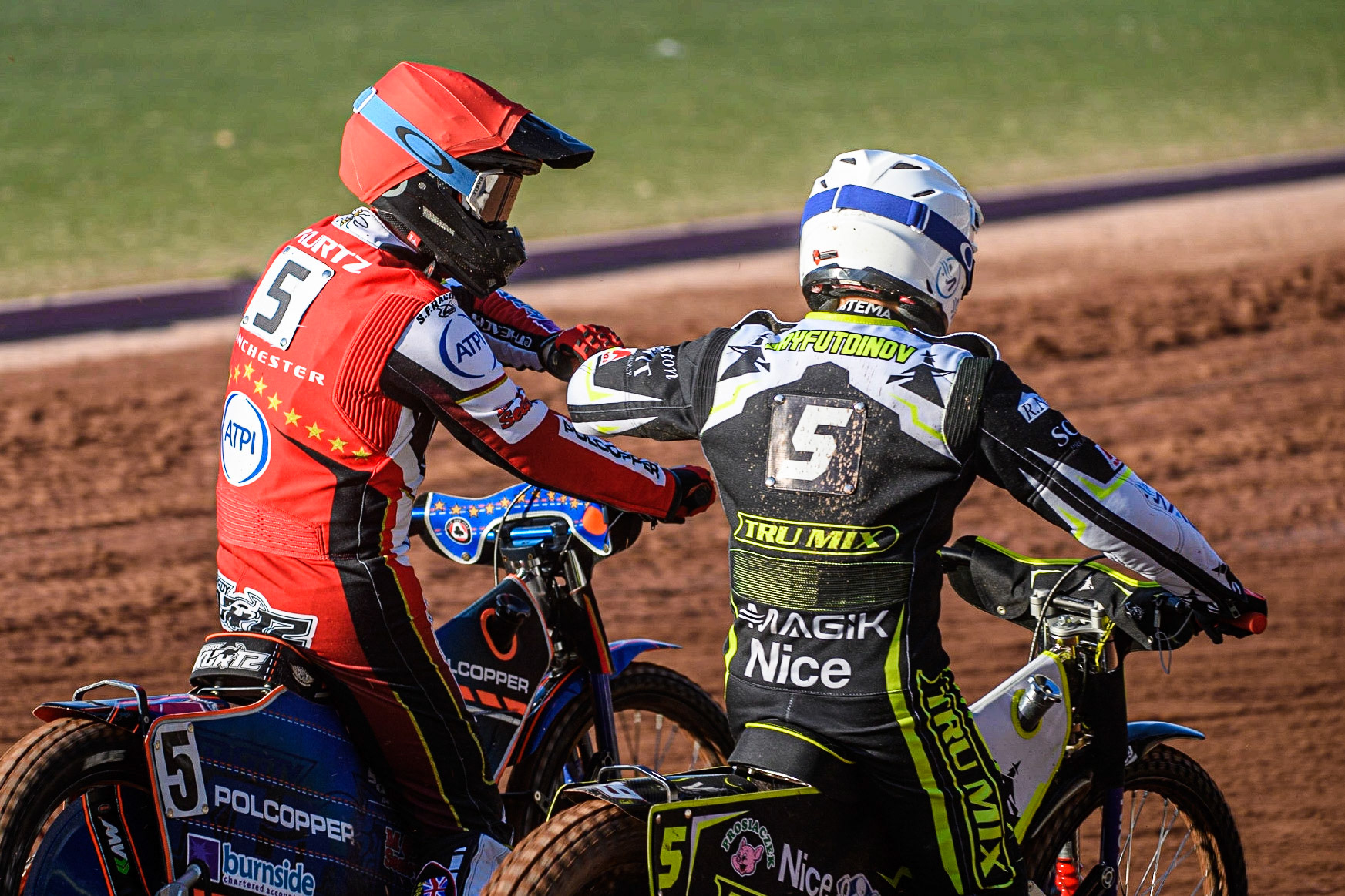 Brady Kurtz (Red) congratulates Emil Sayfutdinov after his heat win during the Sports Insure Premiership match between Belle Vue Aces and Ipswich Witches at the National Speedway Stadium, Manchester on Monday 5th June 2023. (Photo: Ian Charles | MI News)