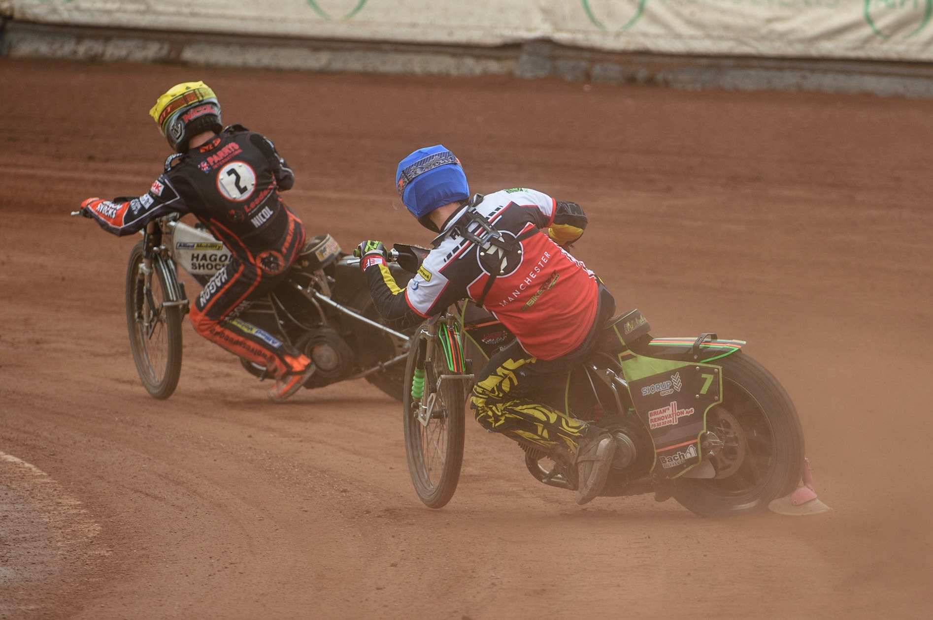 MANCHESTER, UK. AUGUST 30TH Nikolaj B. Jakobsen  (Blue) chases Broc Nicol  (Yellow) during the SGB Premiership match between Belle Vue Aces and Wolverhampton Wolves at the National Speedway Stadium, Manchester on Monday 30th August 2021. (Credit: Ian Charles | MI News)