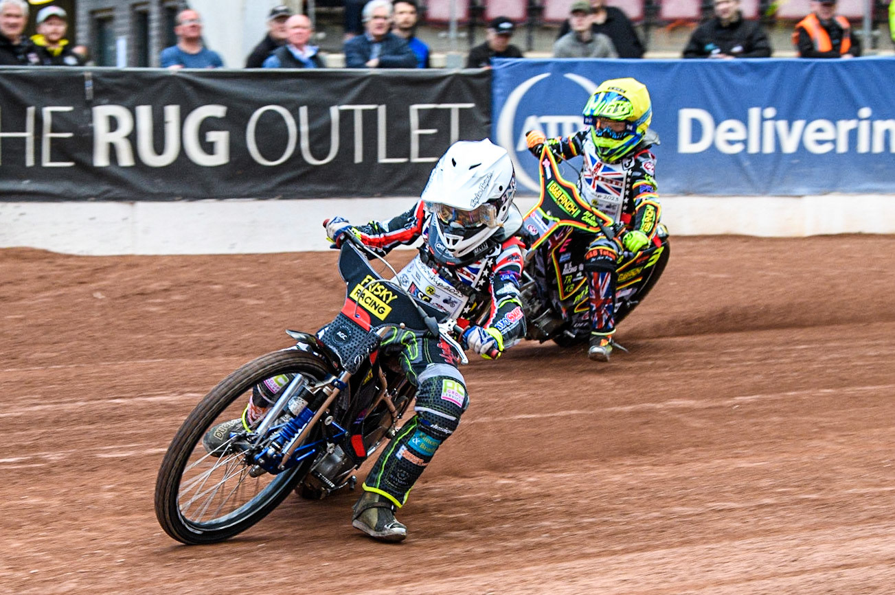 Seth Norman (White) leads Archie Rolph  (Yellow)  during the British Youth Championships at the National Speedway Stadium, Manchester on Friday 12th May 2023. (Photo: Ian Charles | MI News)
