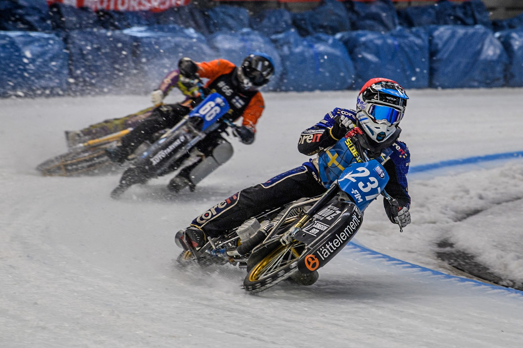 237\ (Red) leads  Finland's Aki Ala-Riihimäki (66) (Blue) during the FIM Ice Speedway Gladiators World Championship Final 2 at the Max-Aicher-Arena, Inzell on Sunday 24 March 2024. (Photo: Ian Charles | MI News)