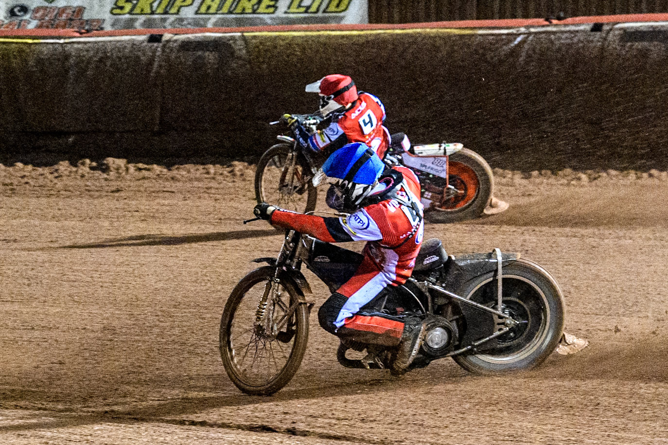 Belle Vue Aces' Antti Vuolas  in Blue rides inside Belle Vue Aces' Guest Rider Niels. K. Iversen  in Red during the Rowe Motor Oil Premiership Grand Final 1st Leg between Belle Vue Aces and Leicester Lions at the National Speedway Stadium, Manchester on Monday 23rd September 2024. (Photo: Ian Charles | MI News)