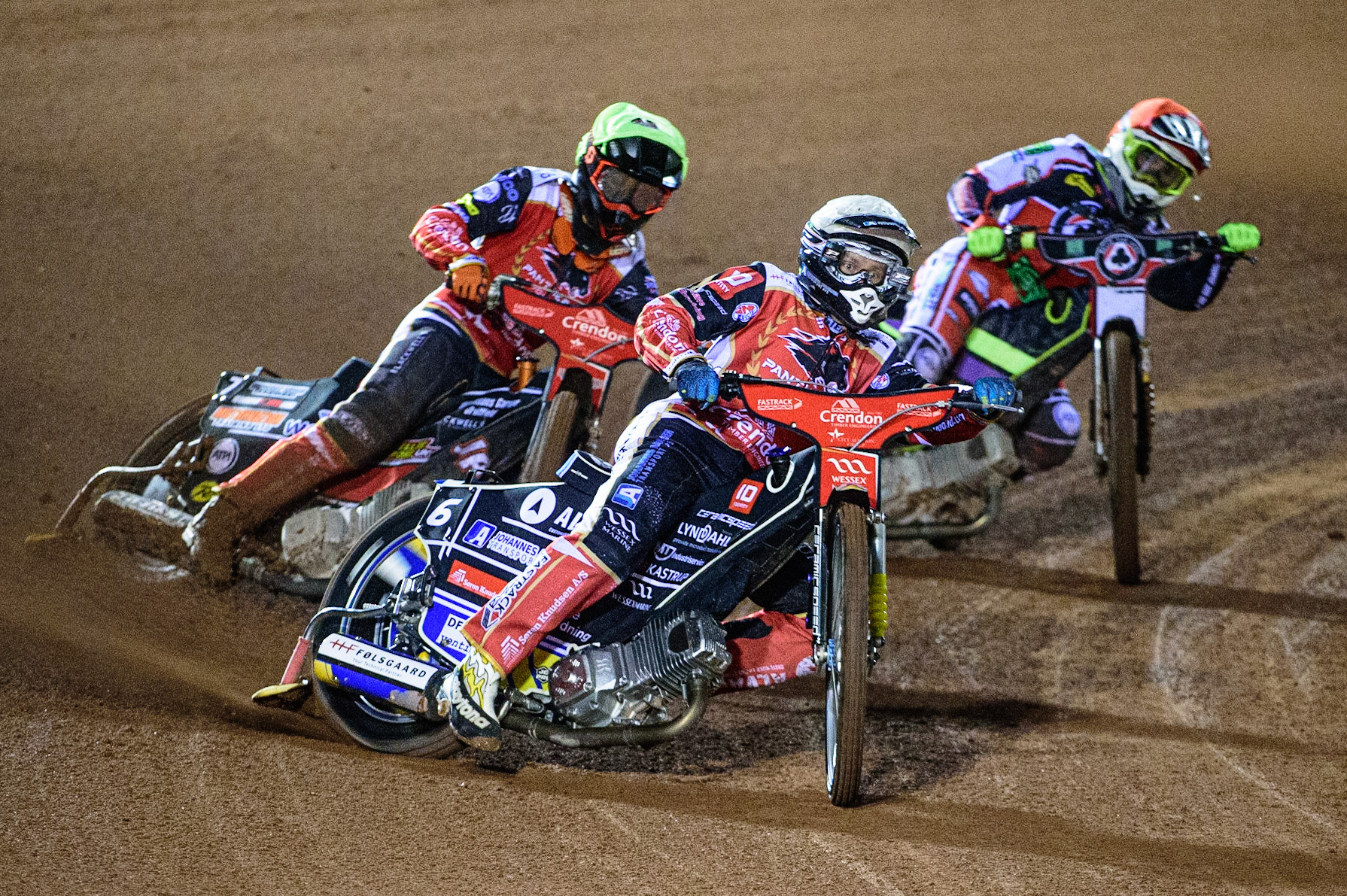 MANCHESTER, UK. OCT 11TH  Bjarne Pedersen  (White) and Jordan Palin  (Yellow) lead Tom Brennan (Red) during the SGB Premiership Grand Final 1st Leg between Belle Vue Aces and Peterborough Panthers at the National Speedway Stadium, Manchester on Monday 11th October 2021. (Credit: Ian Charles | MI News)