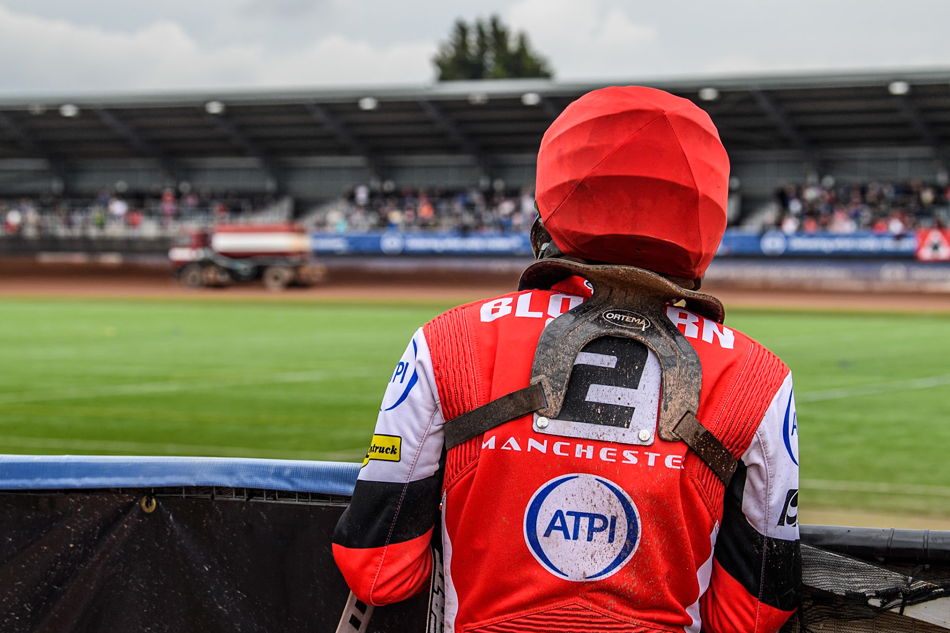 Belle Vue Aces' Norick Blödorn  watches the track prep during the Rowe Motor Oil Premiership match between Belle Vue Aces and Birmingham Brummies at the National Speedway Stadium, Manchester on Monday 6th May 2024. (Photo: Ian Charles | MI News)