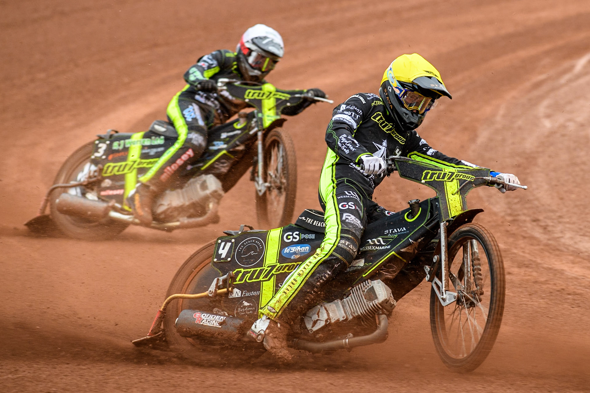 Ipswich Witches' Adam Ellis in Yellow leading team mate Ipswich Witches' Danny King in White during the Rowe Motor Oil Premiership match between Belle Vue Aces and Ipswich Witches at the National Speedway Stadium, Manchester on Monday 1st July 2024. (Photo: Ian Charles | MI News)
