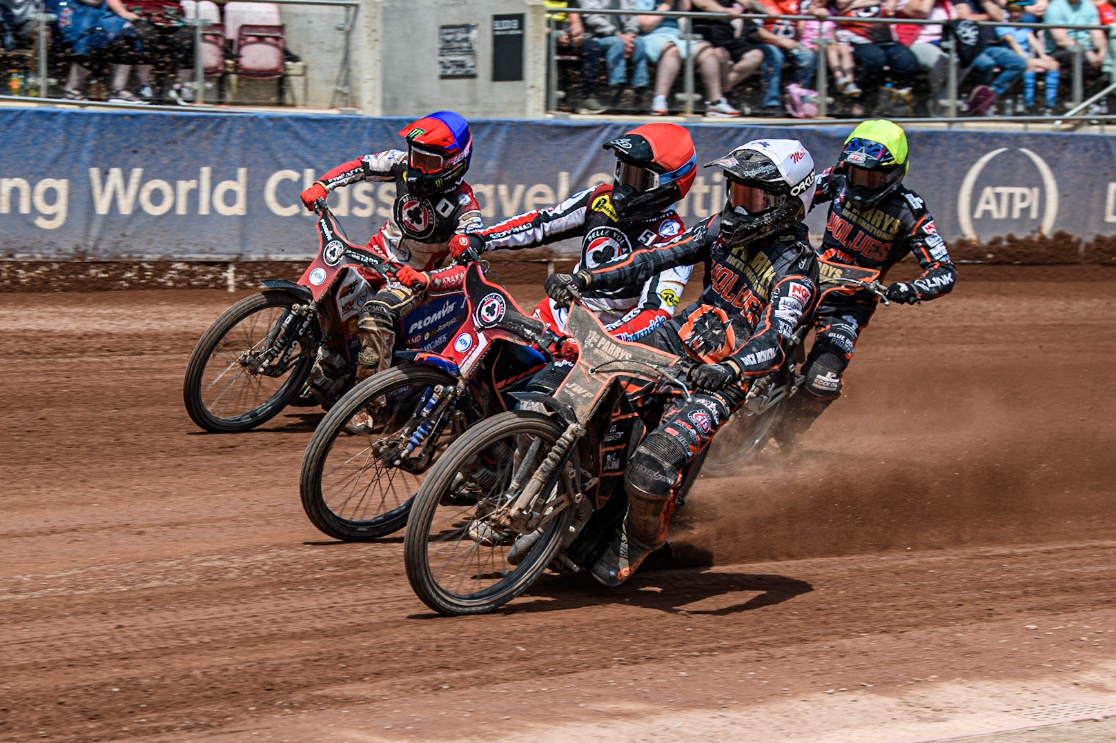 Sam Masters (White) inside Brady Kurtz (Red) and Dan Bewley (Blue)  with Steve Worrall behind during the Sports Insure Premiership match between Belle Vue Aces and Wolverhampton Wolves at the National Speedway Stadium, Manchester on Monday 29th May 2023. (Photo: Ian Charles | MI News)