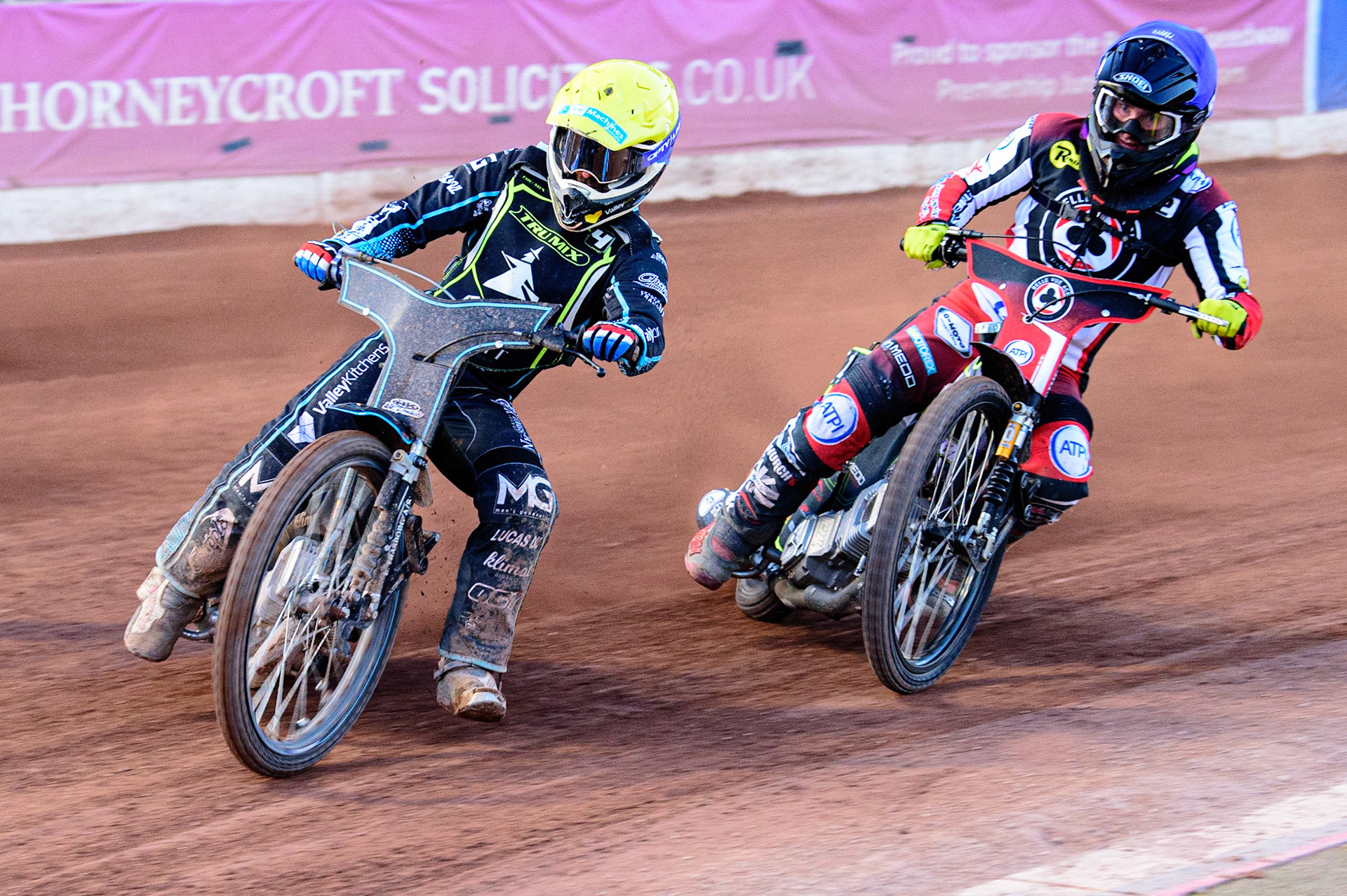 Rohan Tungate  (Yellow) leads Tom Brennan  (Blue) during the SGB Premiership match between Belle Vue Aces and Ipswich Witches at the National Speedway Stadium, Manchester on Monday 8th August 2022. (Credit: Ian Charles | MI News)