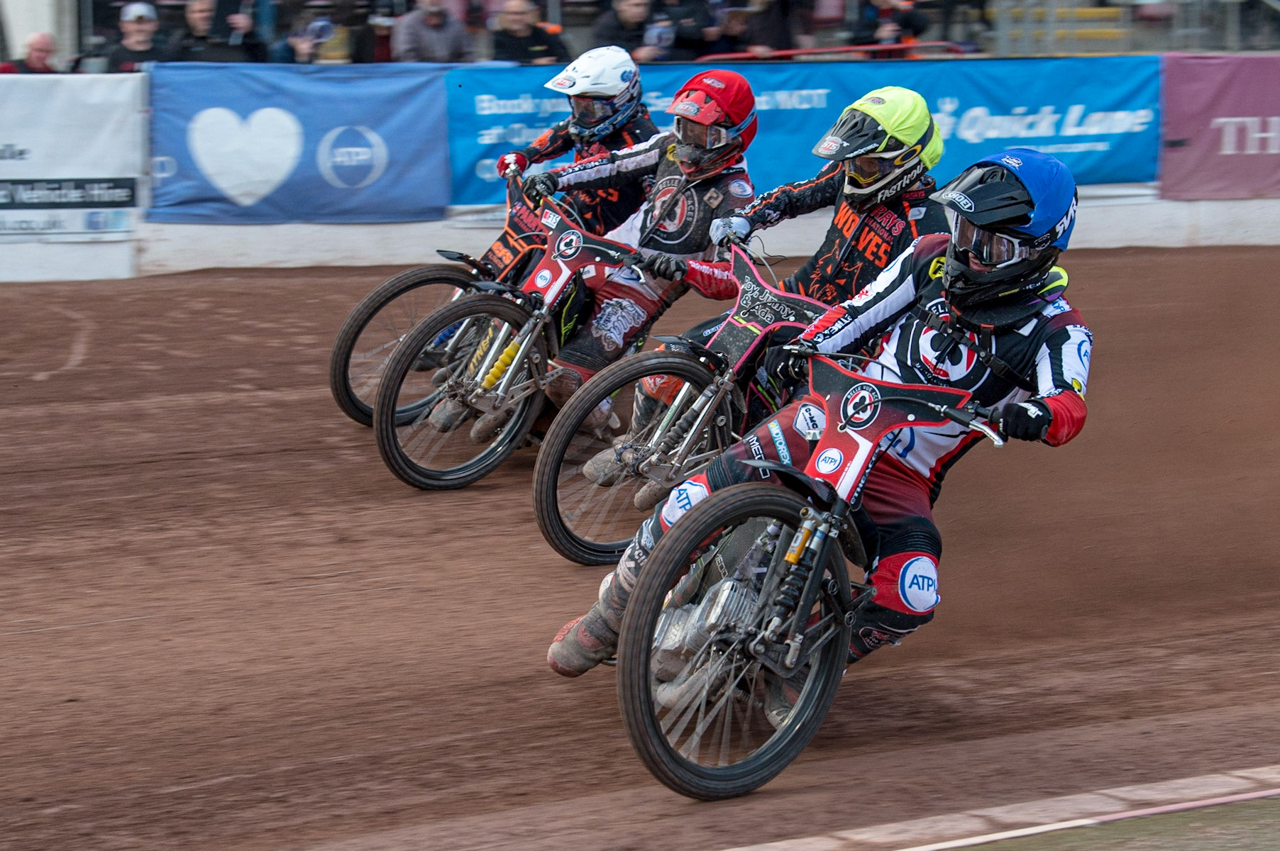 MANCHESTER, UK. JUN 13TH Tom Brennan  (Blue) inside Leon Flint  (Yellow), Jye Etheridge  (Red) and Steve Worrall  (White) during the SGB Premiership match between Belle Vue Aces and Wolverhampton  Wolves at the National Speedway Stadium, Manchester on Monday 13th June 2022. (Credit: Ian Charles | MI News)