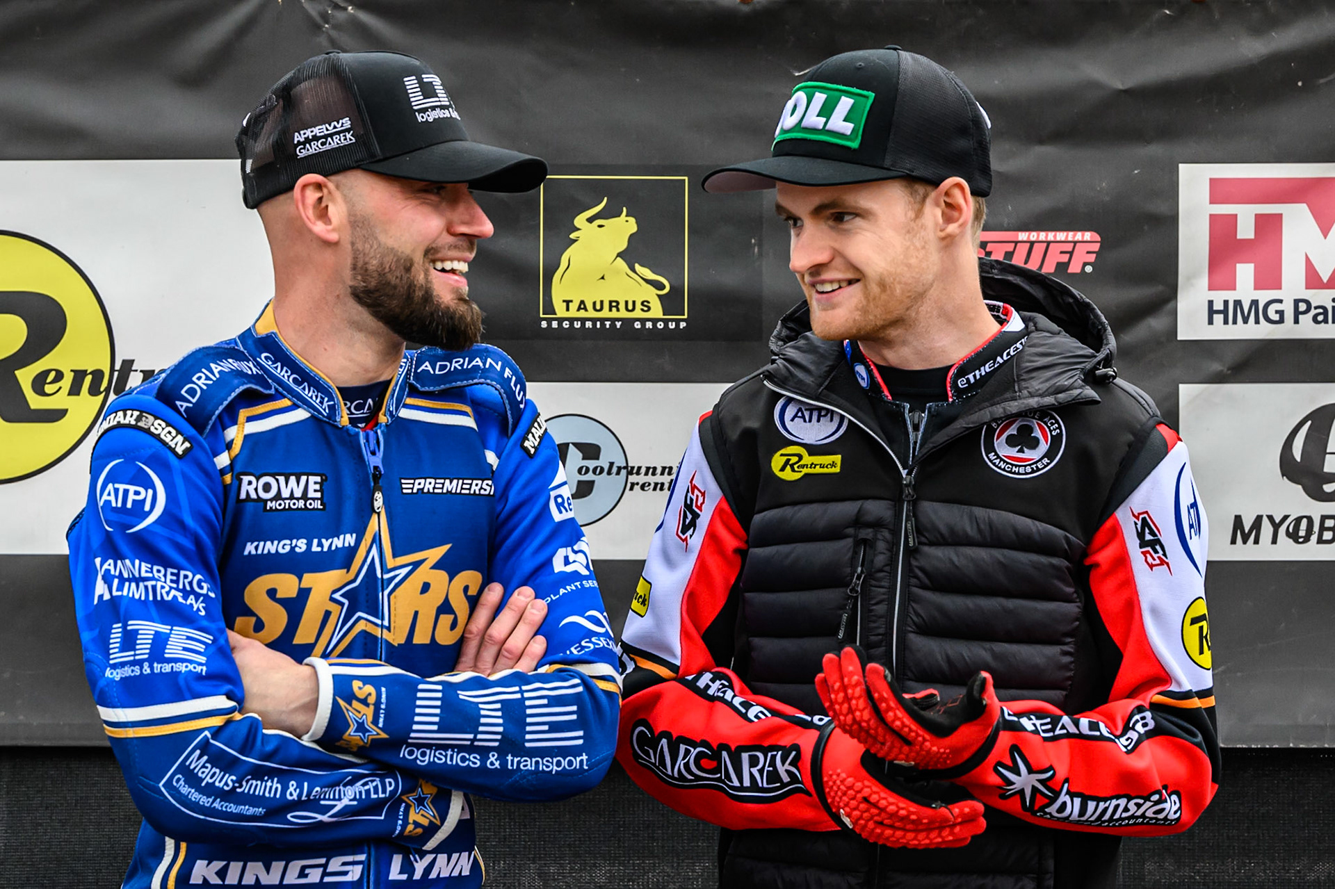 Kings Lynn Stars' Nicolai Klindt (Left)’ chats with Belle Vue Aces' Brady Kurtz as they wait to be interviewed by BVTV during the Rowe Motor Oil Premiership match between Belle Vue Aces and King's Lynn Stars at the National Speedway Stadium, Manchester on Monday 23rd June 2025. (Photo: Ian Charles | MI News)