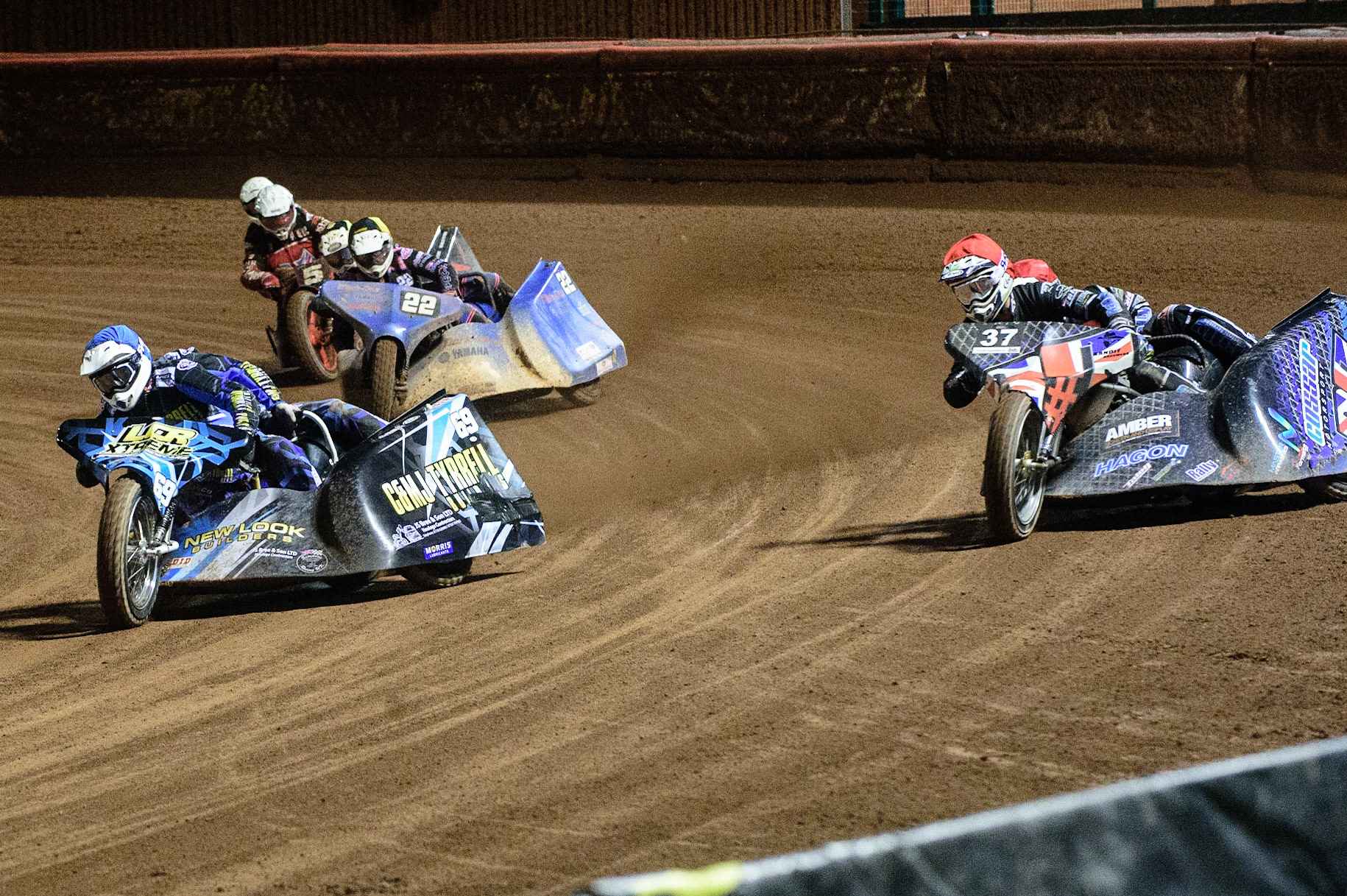 MANCHESTER, UK. OCT 30TH   \f69\ (Blue) inside Mark Cossar &amp; Gareth Williams  (Red) with Will Penfold &amp; Ricky Pay  (Yellow) and Mick Cave &amp; Bradley Steer  behind during the Manchester Masters Sidecar Speedway and Flat Track Racing at the National Speedway Stadium, Manchester on Saturday 30th October 2021. (Credit: Ian Charles | MI News)