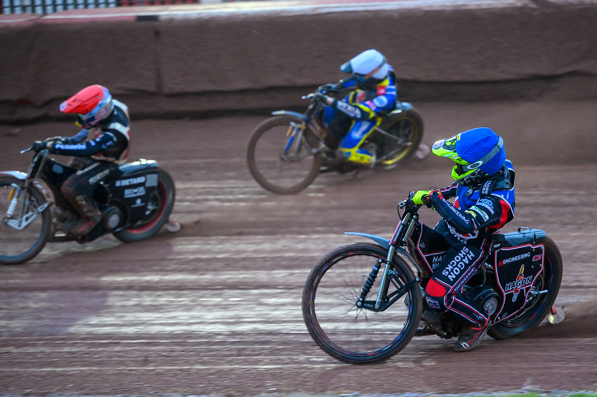 Reserve Sam Hagon of Great Britain  in Blue chases Maciej Janowski of Poland in Red and Anders Rowe of Great Britain in White during the Speedway GP Qualifying Round 3 at Allied Ashfield Stadium, Glasgow on Saturday 30th May 2026. (Photo: Ian Charles | MI News)