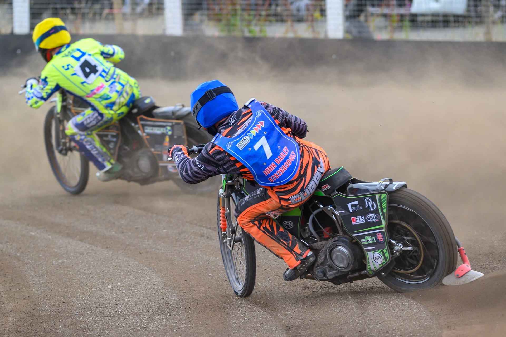 Jack Roberts of Buxton Bulls in Blue chases Ashton Vale of Oxford Chargers in Yellow during the WSRA National Development League match between Buxton Bulls and Oxford Chargers at Hi-Edge Speedway, Buxton on Sunday 2nd August 2026. (Photo: Ian Charles | MI News)