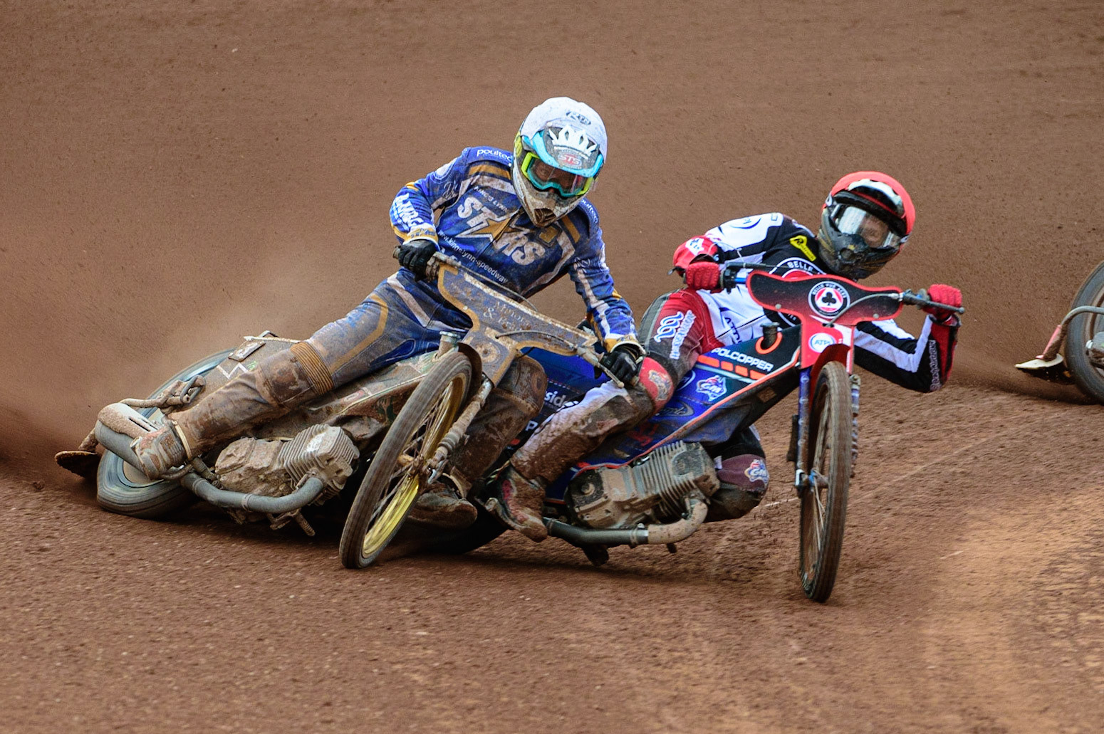 MANCHESTER UK Brady Kurtz  (Red) shoves Richard Lawson (White) out of the way  during the SGB Premiership match between Belle Vue Aces and King's Lynn Stars at the National Speedway Stadium, Manchester on Monday 11th July 2022. (Credit: Ian Charles | MI News)