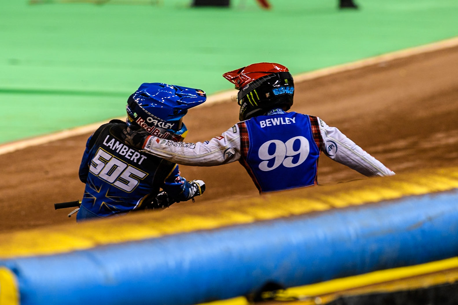 Daniel Bewley (99) of Great Britain in Red celebrates winning the Final with 2nd places Robert Lambert (505) of Great Britain in Blue during the FIM Speedway Grand Prix of Great Britain at The Principality Stadium, Cardiff on Saturday 17th August 2024. (Photo: Ian Charles | MI News)