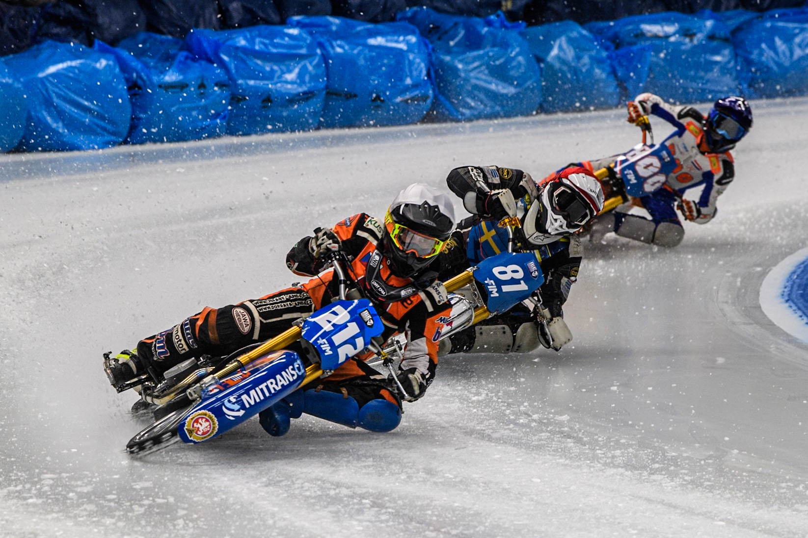 Lukas Hutla (212) of the Czech Republic in White leading Jimmy Olsén (81) of Sweden in Red and Jasper Iwema (800) of The Netherlands in Blue during the Ice Speedway Gladiators World Championship Final 1 at Max-Aicher-Arena, Inzell on Saturday 15th March 2025. (Photo: Ian Charles | MI News)