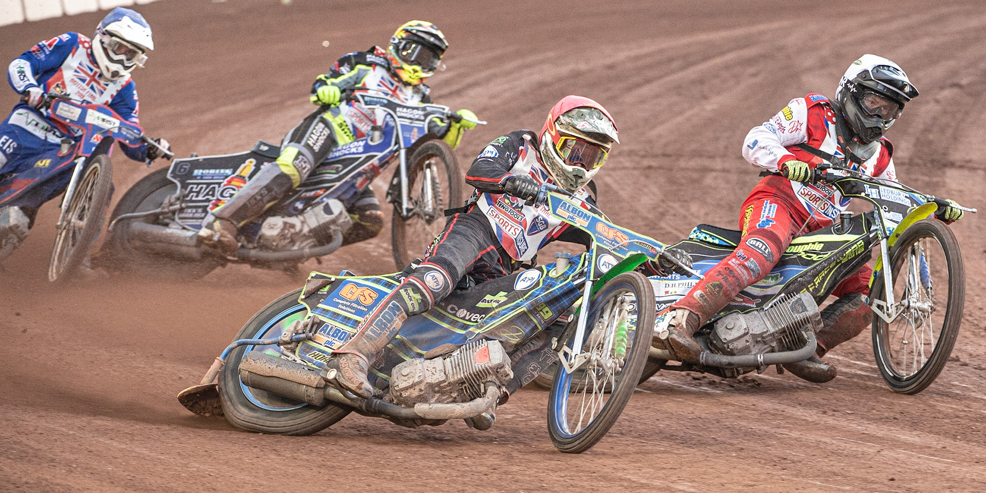 Photo: Ian Charles

Dan Bewley (Red) outside Paul Starke (White) with Edward Kennett (Yellow) and Josh Auty (Blue) behind

Sports Insure British Final,  Belle Vue National Speedway Stadium, Manchester Monday 29  July  2019