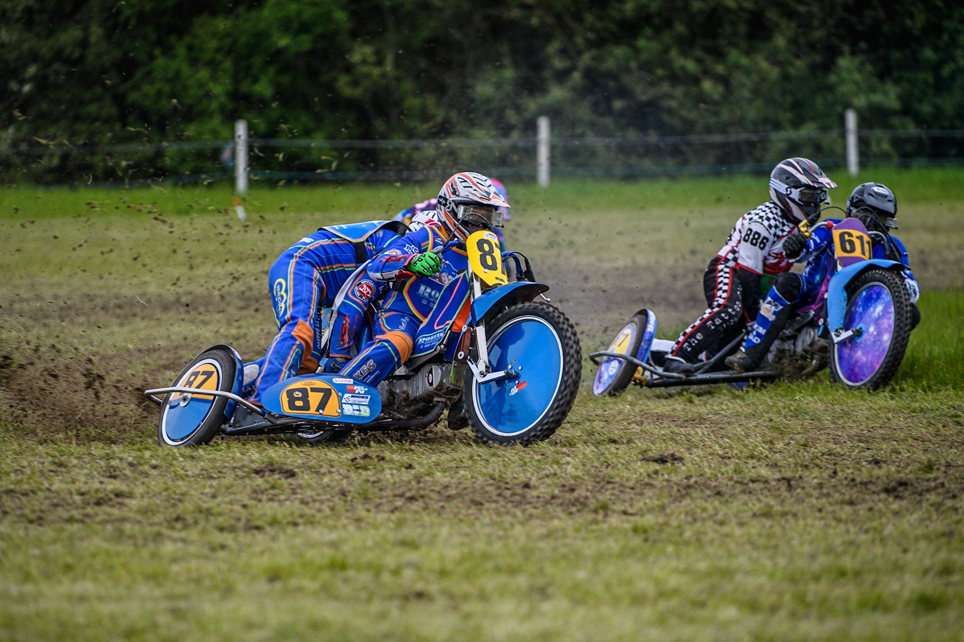Richard Jenner and Adrian North (87) lead John Cox and Jack Roberts in the 500cc Sidecar Class during the Cheshire Grass Track Three Trophies meeting at High Legh, Cheshire on Sunday 14th May 2023. (Photo: Ian Charles | MI News)