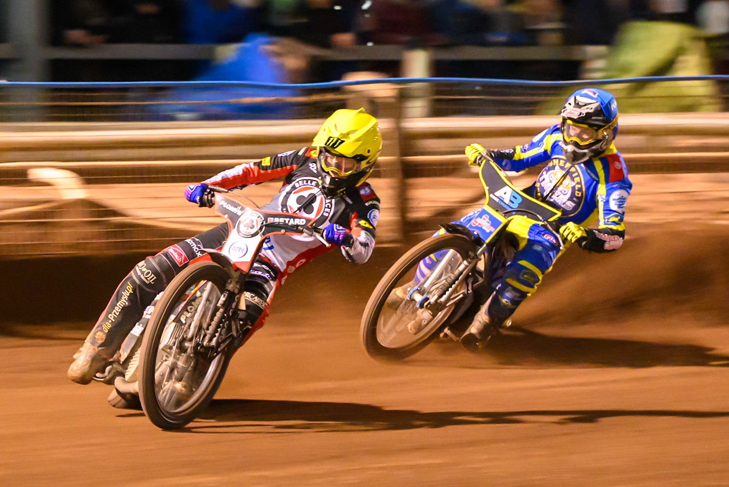 Dan Bewley of Belle Vue Aces in White leading Josh Pickering of Sheffield Tigers  in Blue during the Knockout Cup Northern Section match between Sheffield Tigers and Belle Vue Aces at Owlerton Stadium, Sheffield on Thursday 2nd April 2026. (Photo: Ian Charles | MI News)