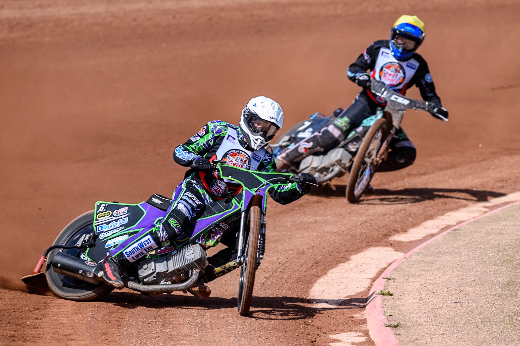 Kai Ward of Middlesborough Tigers  in White leading team mate Charlie Southwick  during the WSRA National Development League match between Belle Vue Colts and Middlesbrough Tigers at the National Speedway Stadium, Manchester on Sunday 10th August 2025. (Photo: Mark Fletcher | MI News)