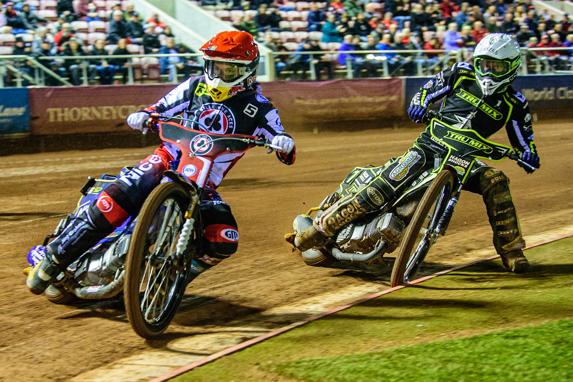 Robert Lambert (Red) leads Jason Doyle  (White) during the SGB Premiership Semi Final 2nd Leg between Belle Vue Aces and Ipswich Witches at the National Speedway Stadium, Manchester on Monday 3rd October 2022. (Credit: Ian Charles | MI News)