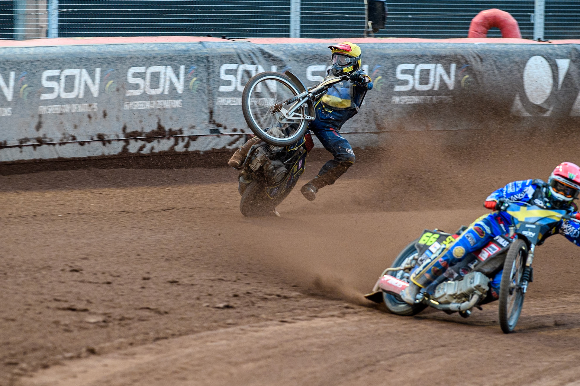 Marko Levishyn of Ukraine in Yellow crashes out of his final heat during the Monster Energy FIM Speedway of Nations Semi-Final 1 at the National Speedway Stadium, Manchester on Tuesday 9th July 2024. (Photo: Ian Charles | MI News)