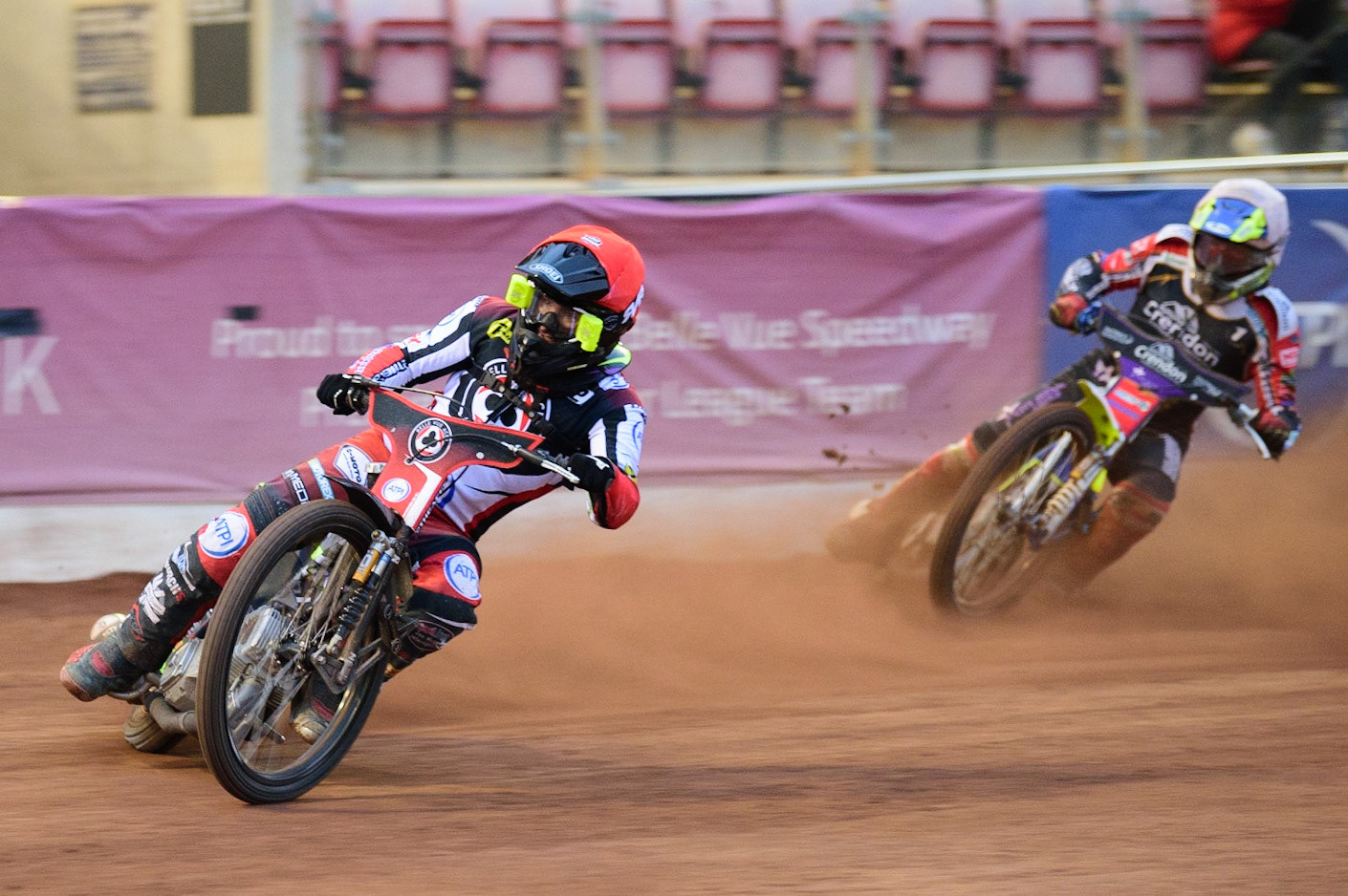 Tom Brennan (Red) leads Chris Harris  (White) during the SGB Premiership match between Belle Vue Aces and Peterborough at the National Speedway Stadium, Manchester on Monday 25th July 2022. (Credit: Ian Charles | MI News