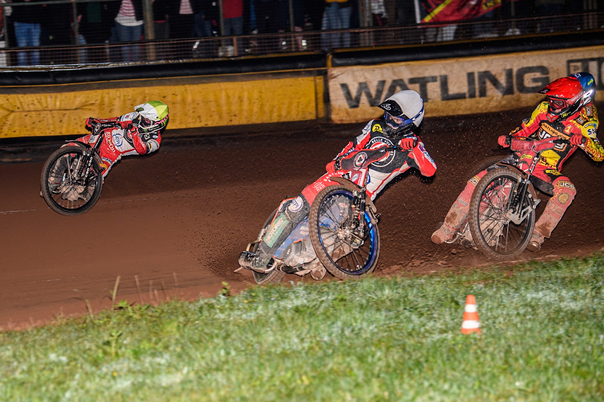 Belle Vue Aces' Brady Kurtz in White and Belle Vue Aces' Dan Bewley in Yellow leading Leicester Lions' Max Fricke in Red and Leicester Lions' Ryan Douglas during the Rowe Motor Oil Premiership Grand Final 2nd Leg between Leicester Lions and Belle Vue Aces at the Pidcock Motorcycles Arena, Leicester on Thursday 26th September 2024. (Photo: Ian Charles | MI News)