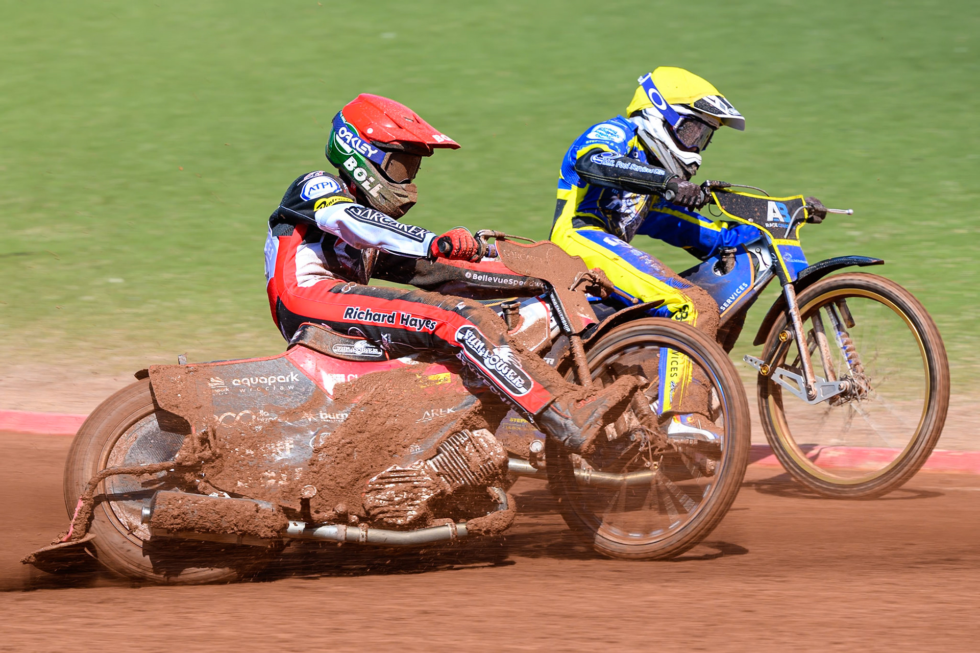Brady Kurtz of Belle Vue Aces in Red rides outside Anders Rowe of Sheffield Tigers in Yellow during the Rowe Motor Oil Premiership match between Belle Vue Aces and Sheffield Tigers at the National Speedway Stadium, Manchester on Monday 25th May 2026. (Photo: Ian Charles | MI News)