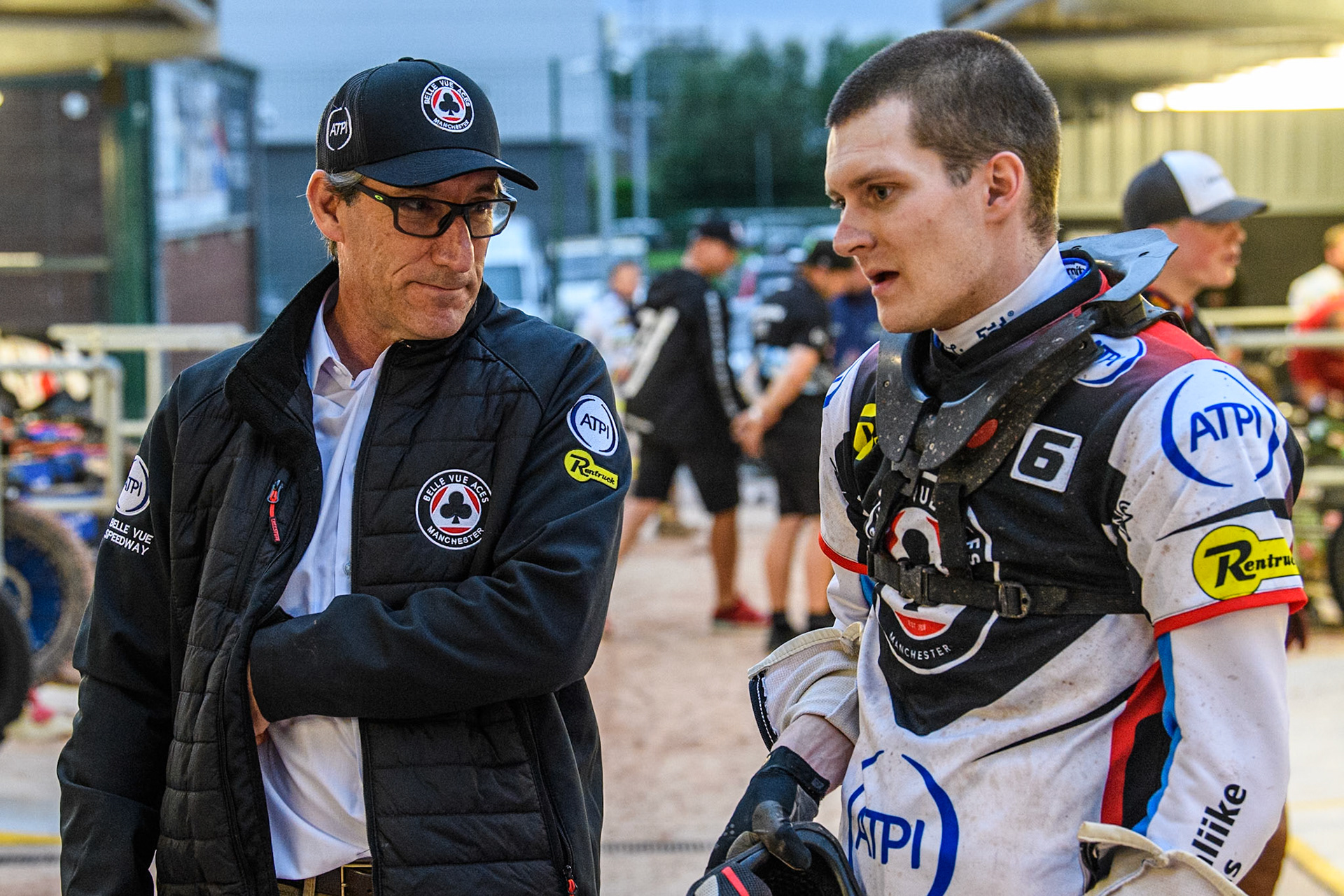 Belle Vue Aces' Team Manager Mark Lemon (Left) chats with Belle Vue Aces' guest Antti Vuolas during the Rowe Motor Oil Premiership match between Belle Vue Aces and Oxford Spires at the National Speedway Stadium, Manchester on Monday 22nd July 2024. (Photo: Ian Charles | MI News)