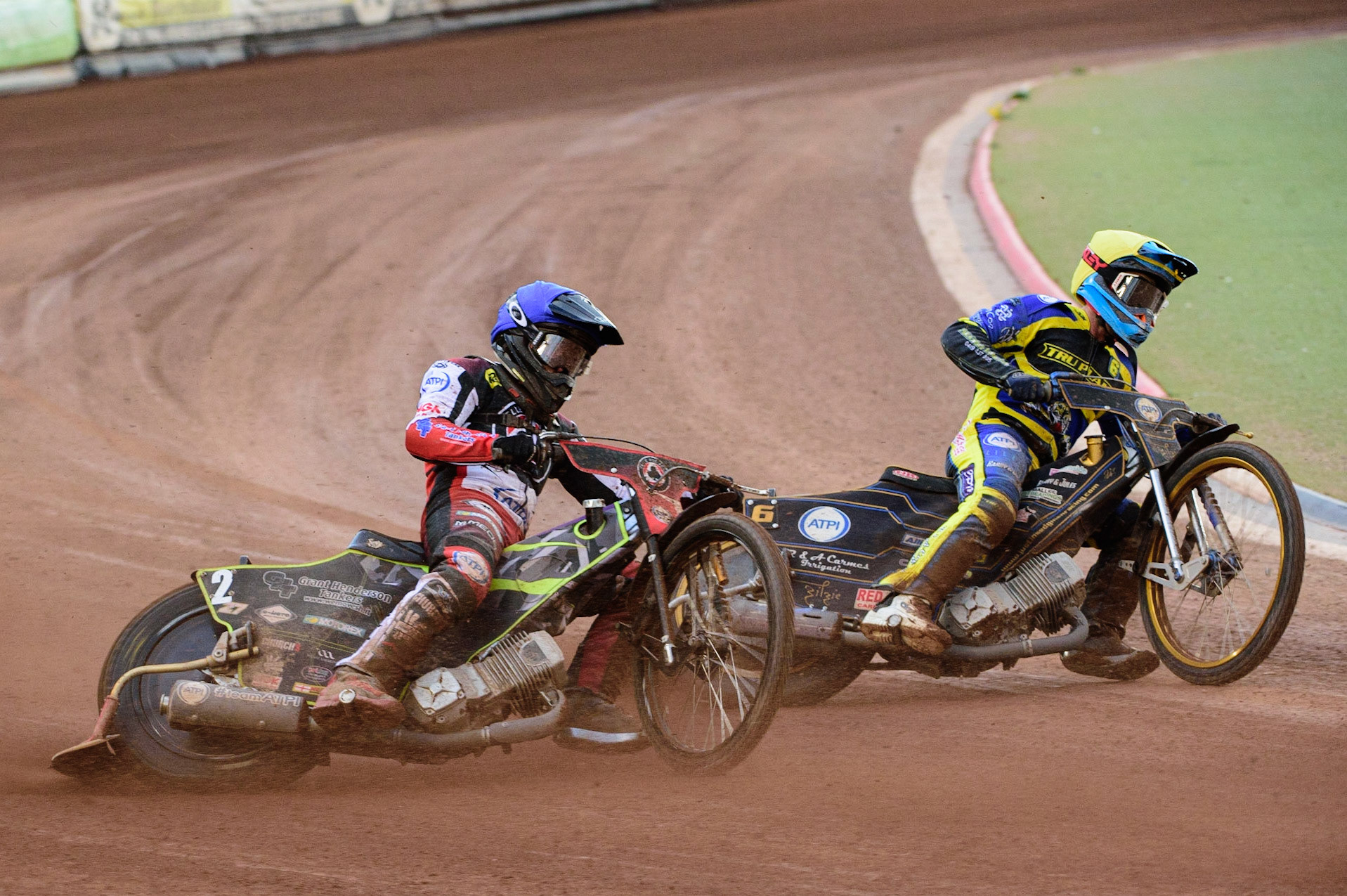 MANCHESTER, UK. JUL 5TH  Tom Brennan  (Blue) outside Justin Sedgmen  (Yellow)  during the SGB Premiership match between Belle Vue Aces and Sheffield Tigers at the National Speedway Stadium, Manchester on Tuesday 5th July 2022. (Credit: Ian Charles | MI News)