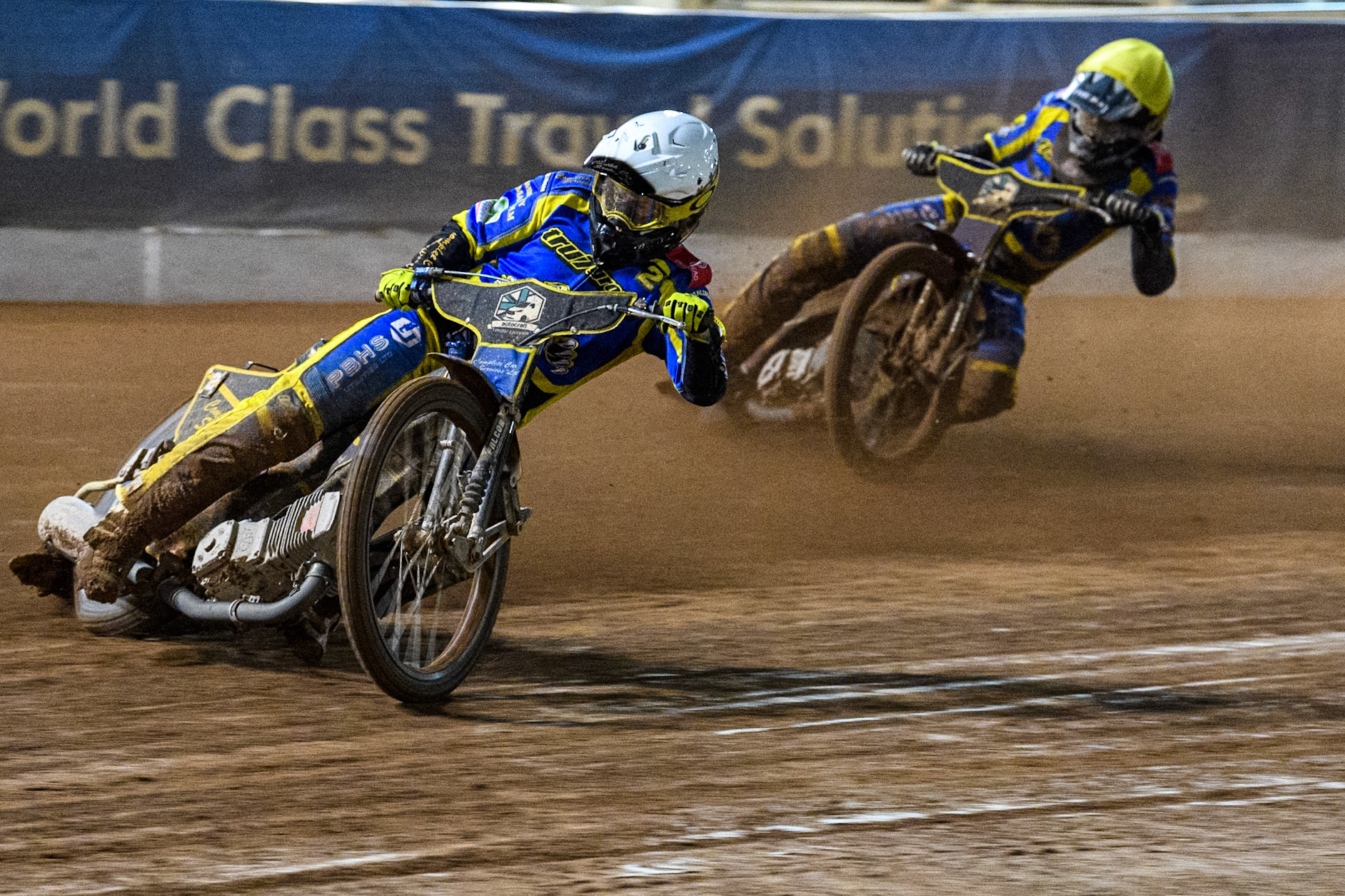 Sheffield Tigers' Kyle Howarth  in White leading Sheffield Tigers' Dan Gilkes  in Yellow during the Rowe Motor Oil Premiership Play Off Semi Final 2, 1st Leg match between Belle Vue Aces and Sheffield Tigers at the National Speedway Stadium, Manchester on Monday 16th September 2024. (Photo: Ian Charles | MI News)