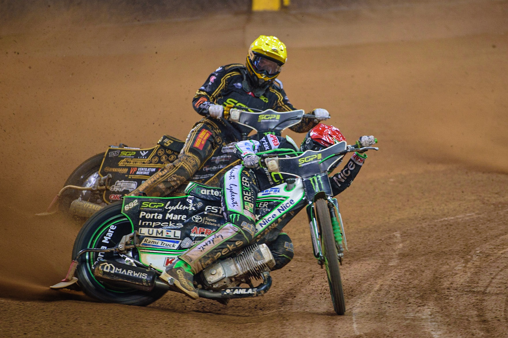 Patryk Dudek (692) (Red) leads Anders Thomsen (105) (Yellow) during the FIM  Speedway Grand Prix of Great Britain at the Principality Stadium, Cardiff on Saturday 13th August 2022. (Credit: Ian Charles | MI News