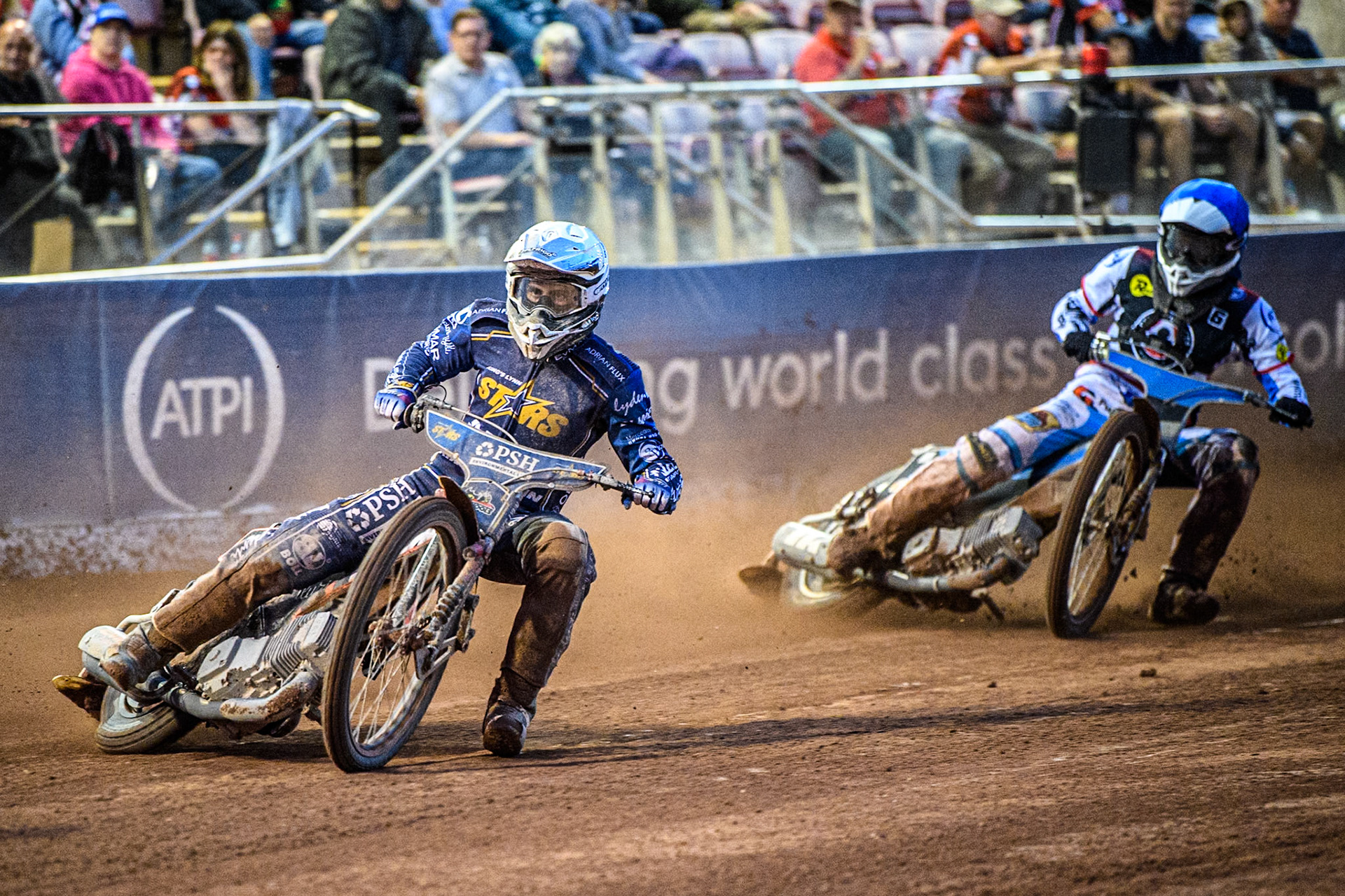 Kings Lynn Stars' Jan Kvech  in White leading Belle Vue Aces' Antti Vuolas  in Blue during the Rowe Motor Oil Premiership match between Belle Vue Aces and King's Lynn Stars at the National Speedway Stadium, Manchester on Monday 12th August 2024. (Photo: Ian Charles | MI News)