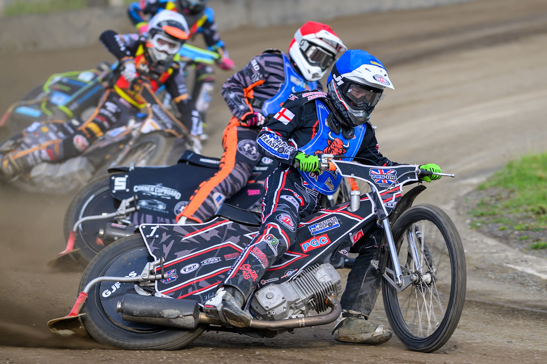 Jack Shimelt of Buxton Bulls  in Blue leading Jack Roberts of Buxton Bulls   in Red  and Ryan Ingram of Leicester Lion Cubs   in White during the WSRA National Development League match between Buxton Bulls and Leicester Lion Cubs at Hi-Edge Speedway, Buxton on Sunday 4th October 2026. (Photo: Ian Charles | MI News)