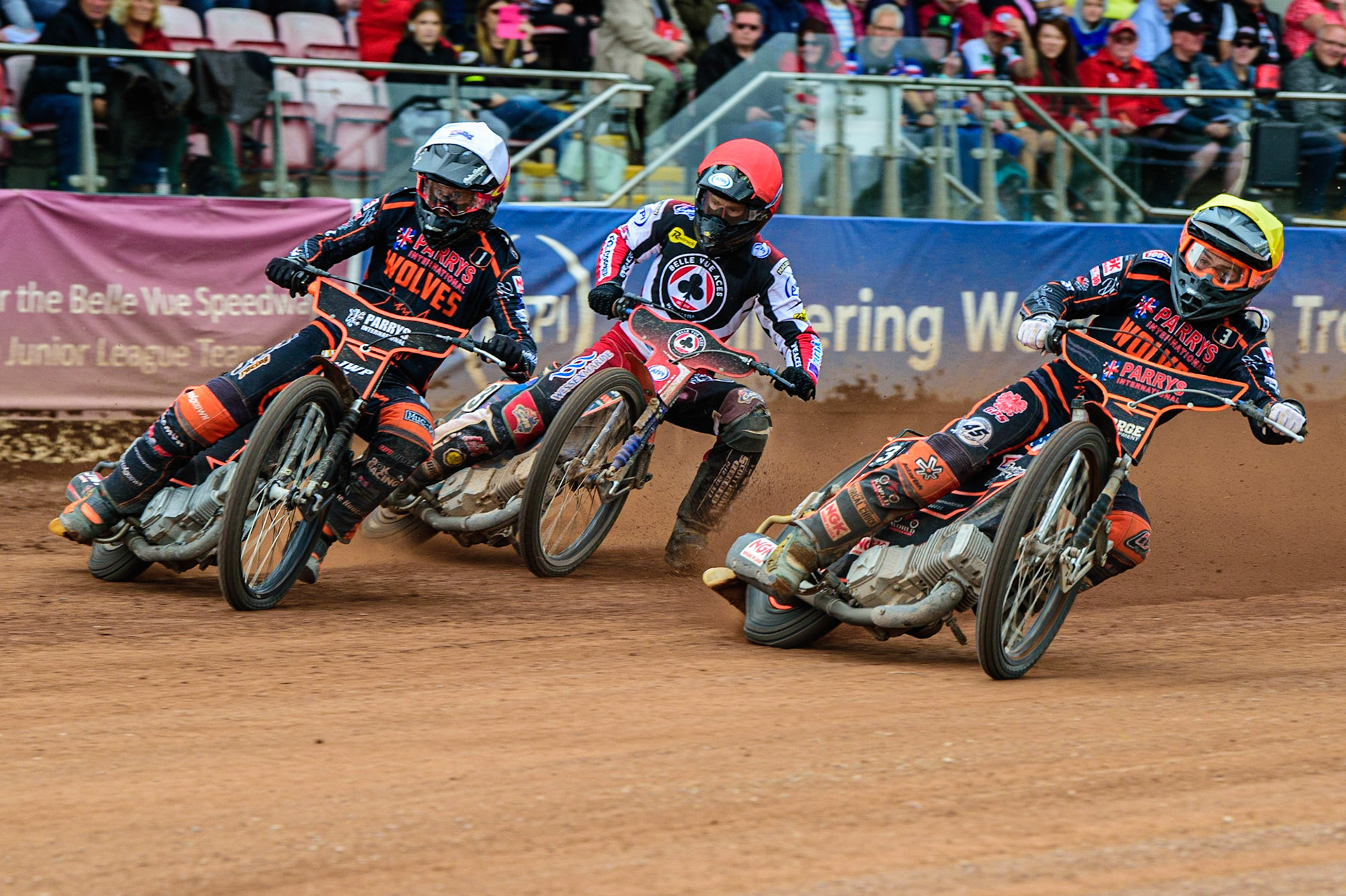 Sam Masters  (White) and Luke Becker (Yellow) lead Brady Kurtz (Red) during the SGB Premiership match between Belle Vue Aces and Wolverhampton Wolves at the National Speedway Stadium, Manchester on Monday 29th August 2022. (Credit: Ian Charles | MI News)