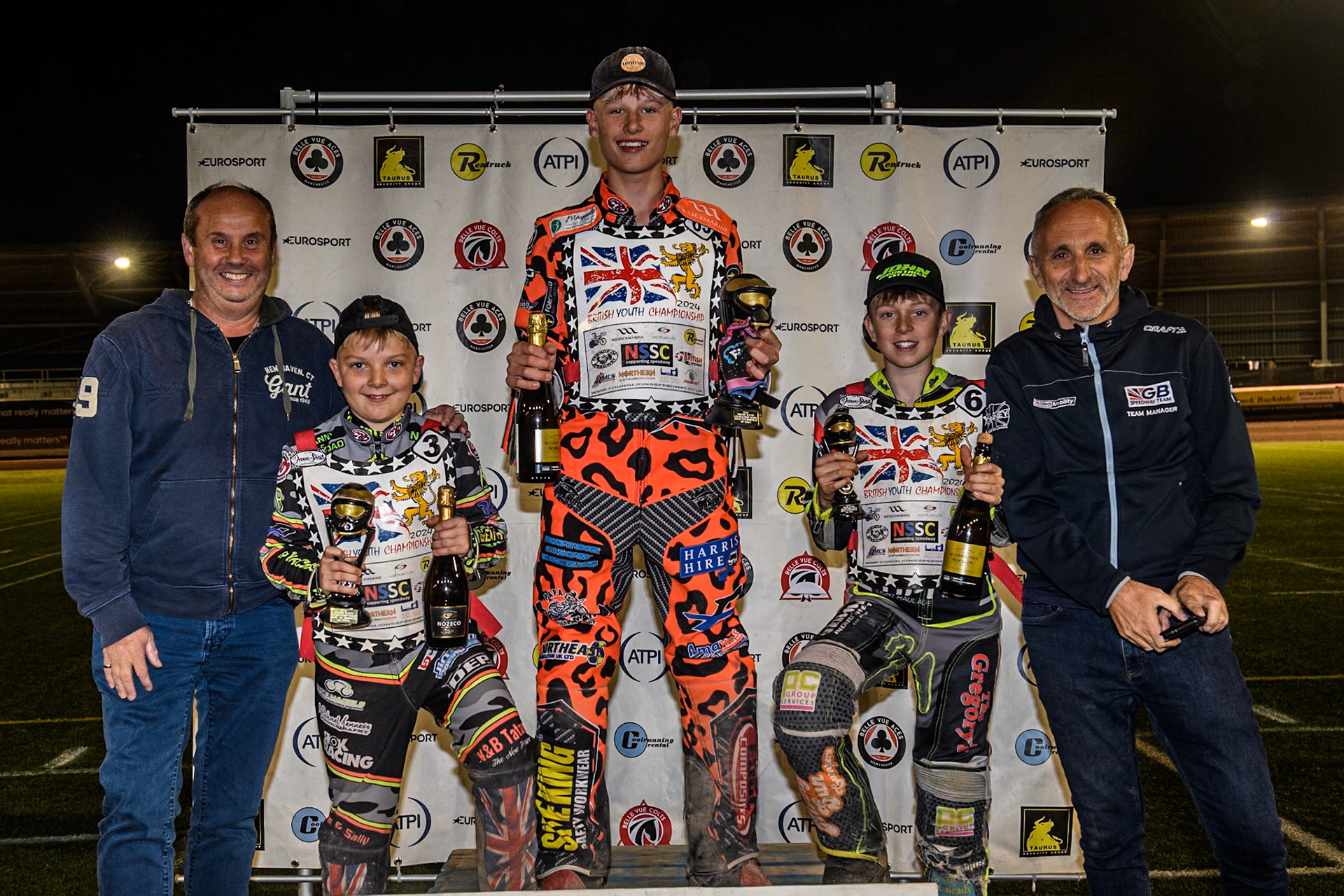 250cc Top3: (L to R) Richard Cotton (Rentruck), Archie Rolph  (2nd), Cooper Rushen (winner), Seth Norman (3rd), Neil Vatcher (GB Youth Team Manager) during the British Youth 250cc Championships at the National Speedway Stadium, Manchester on Friday 30th August 2024. (Photo: Ian Charles | MI News)