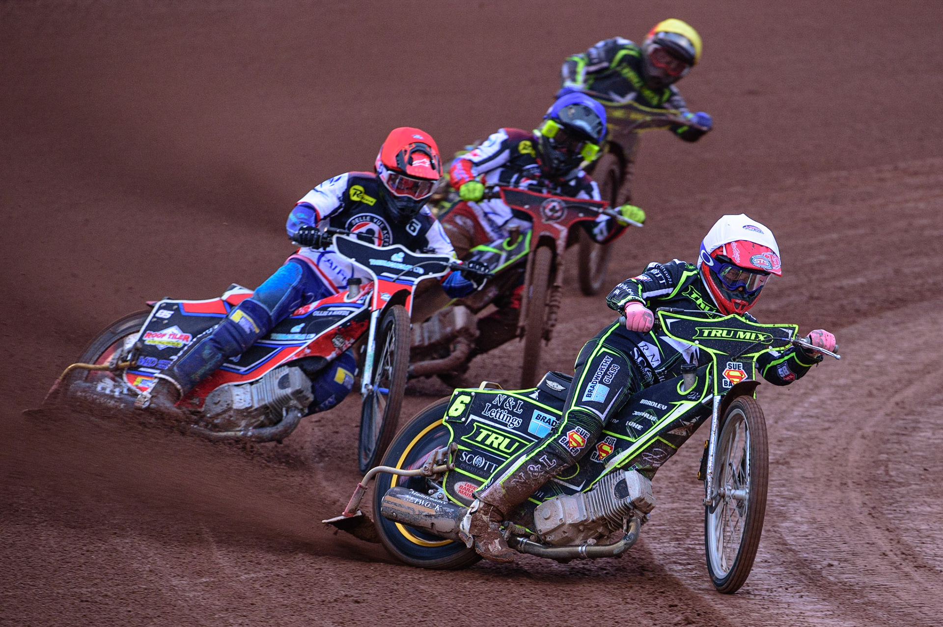 MANCHESTER, UK. JUN 6TH  Ben Barker  (White) leads Zach Cook  (Red) Tom Brennan  (Blue) and Danyon Hume  (Yellow) during the SGB Premiership match between Belle Vue Aces and Ipswich Witches at the National Speedway Stadium, Manchester on Monday 6th June 2022. (Credit: Ian Charles | MI News)