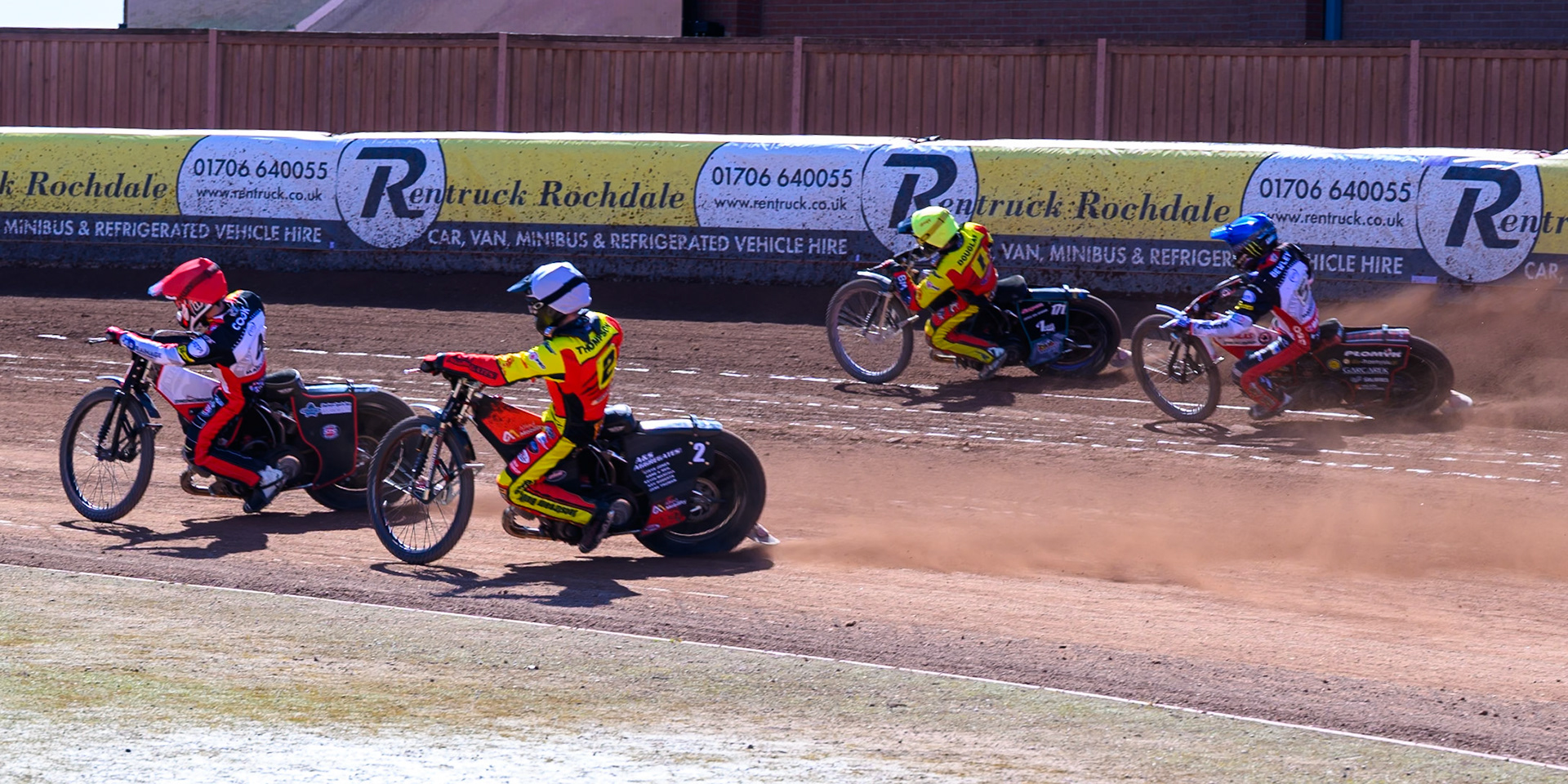 Zach Cook of Belle Vue Aces  in Red leading Dan Thompson of Leicester Lions  in White, Ryan Douglas of Leicester Lions  in Yellow and Dan Bewley  of Belle Vue Aces  in Blue during the Knockout Cup Northern Section match between Belle Vue Aces and Leicester Lions at the National Speedway Stadium, Manchester on Monday 6th April 2026. (Photo: Ian Charles | MI News)