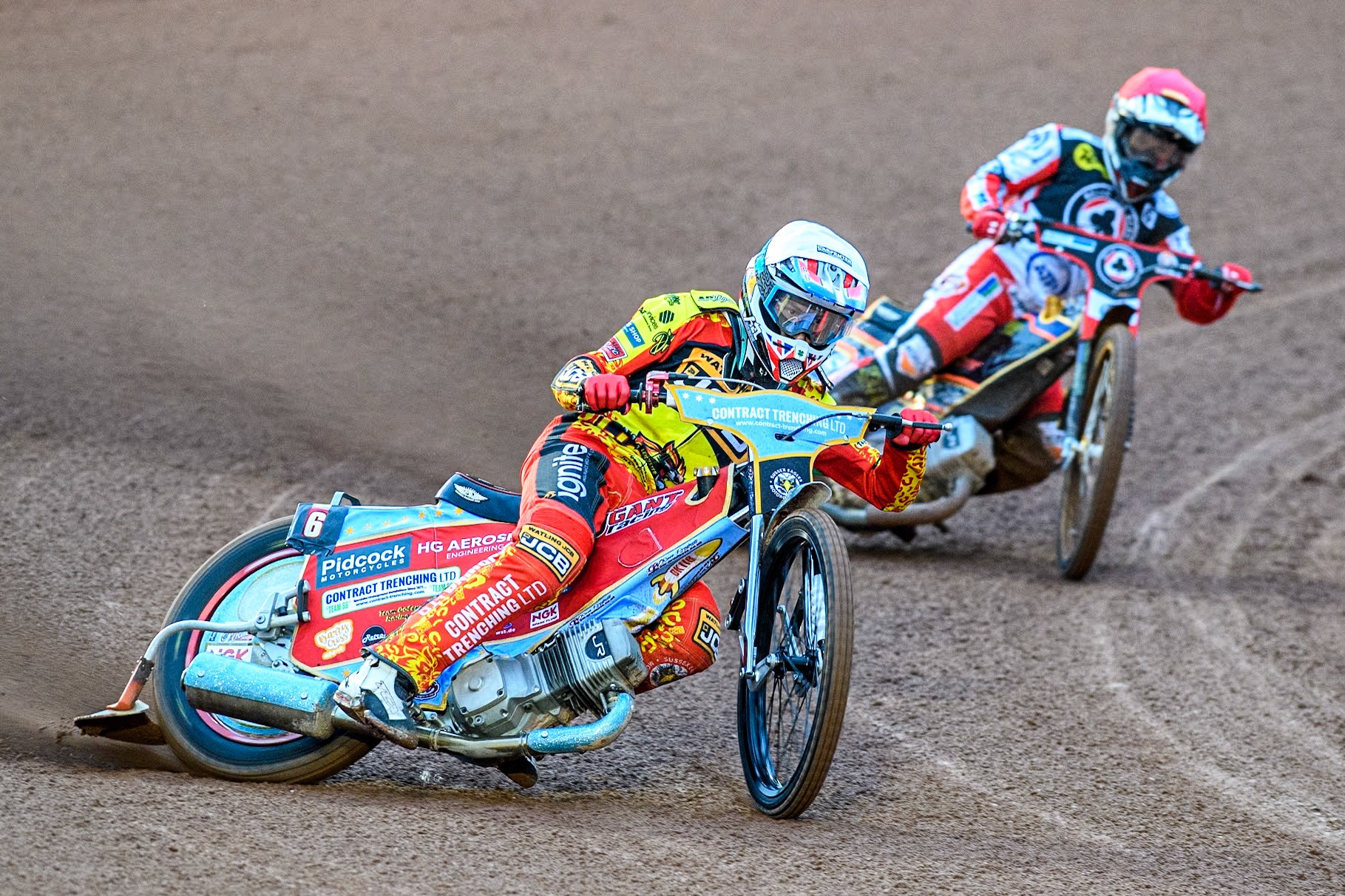 Drew Kemp of Leicester Lions in White leading Connor Mountain of Belle Vue Aces in Red during the Rowe Motor Oil Premiership match between Belle Vue Aces and Leicester Lions at the National Speedway Stadium, Manchester on Saturday 6th April 2024. (Photo: Ian Charles | MI News)