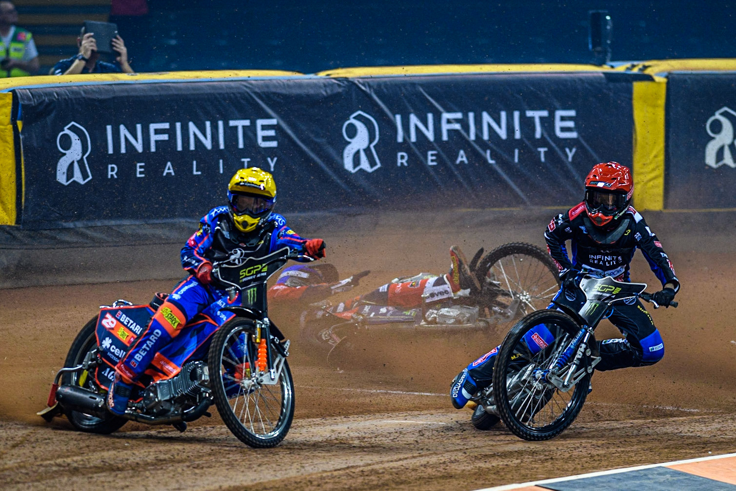 Steve Worrall (16) is a faller behind Leon Madsen (30) (Red)and Andzejs Lebedevs (29) (Yellow)during the FIM Speedway Grand Prix of Great Britain at the Principality Stadium, Cardiff on Saturday 2nd September 2023. (Photo: Ian Charles | MI News)