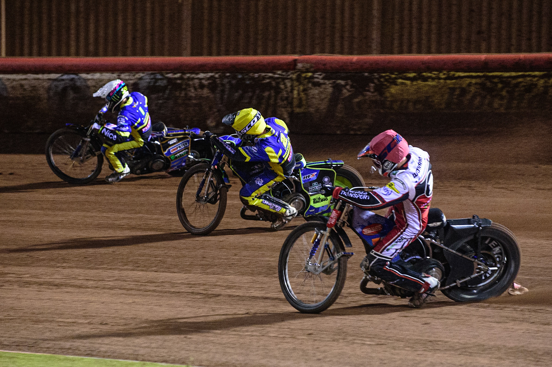 MANCHESTER, UK. OCT 7TH  Steve Worrall   (Red) chases Troy Batchelor  (Yellow) and Jack Holder  (White) during the SGB Premiership Play off Semi-Final Second Leg between Belle Vue Aces and Sheffield Tigers at the National Speedway Stadium, Manchester on Thursday 7th October 2021. (Credit: Ian Charles | MI News)