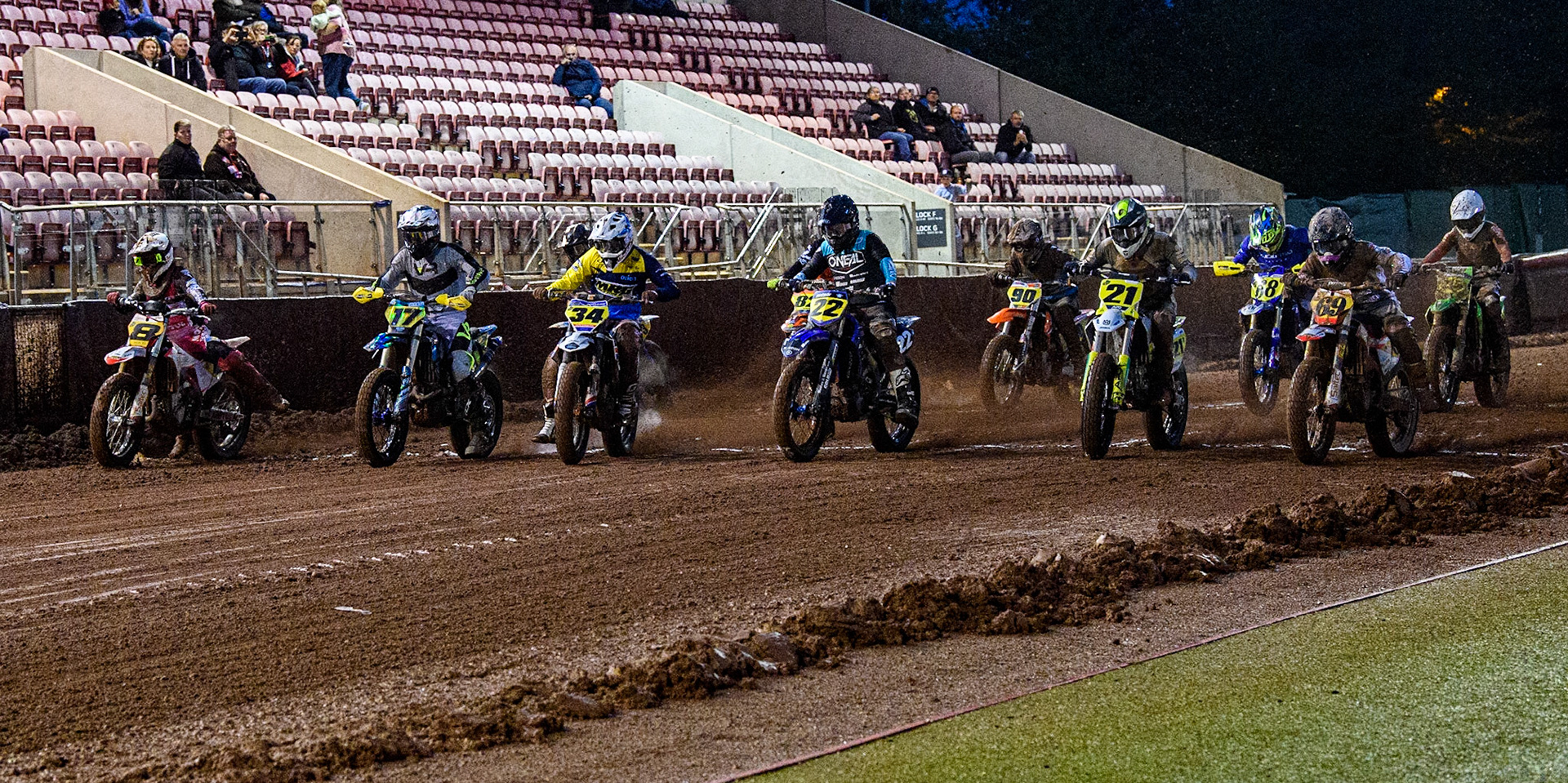 The start of the grand final - 12 riders over 12 laps during the FIM World Flat Track Championship Round 1 at the National Speedway Stadium, Manchester on Saturday 5th August 2023. (Photo: Ian Charles | MI News)